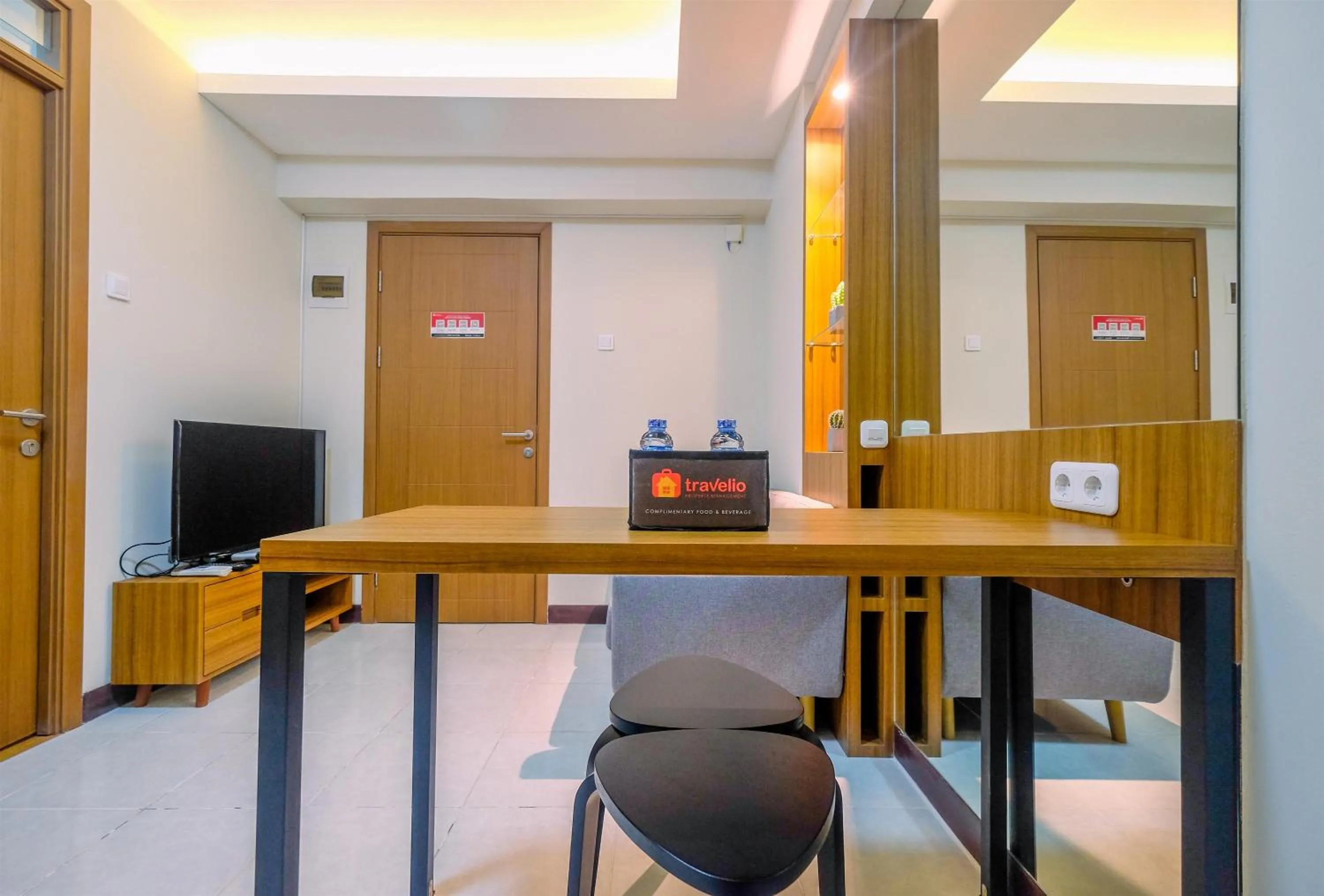 Dining area in Comfortable 2BR Apartment at Cinere Resort By Travelio