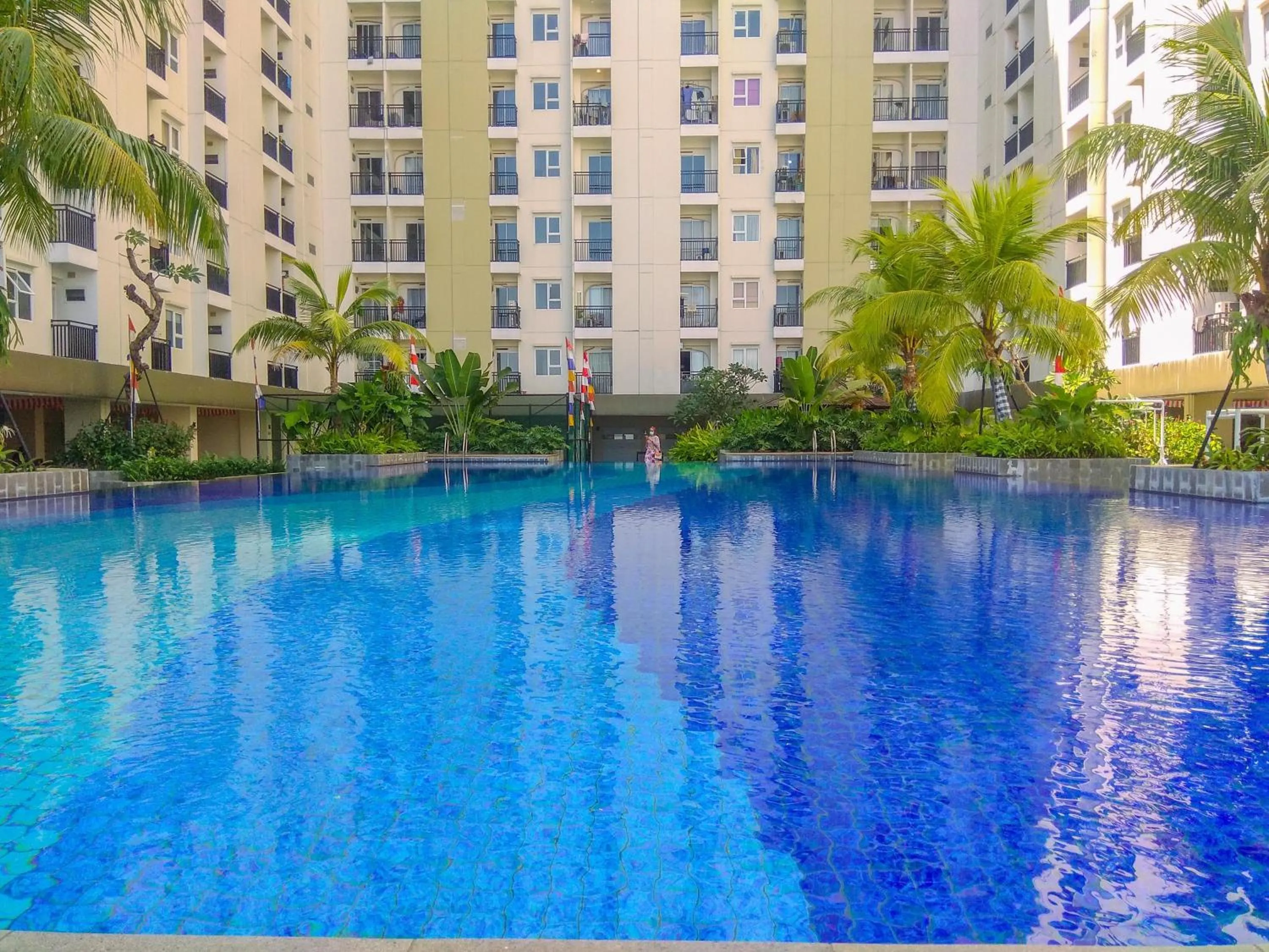 Property building in Comfortable 2BR Apartment at Cinere Resort By Travelio