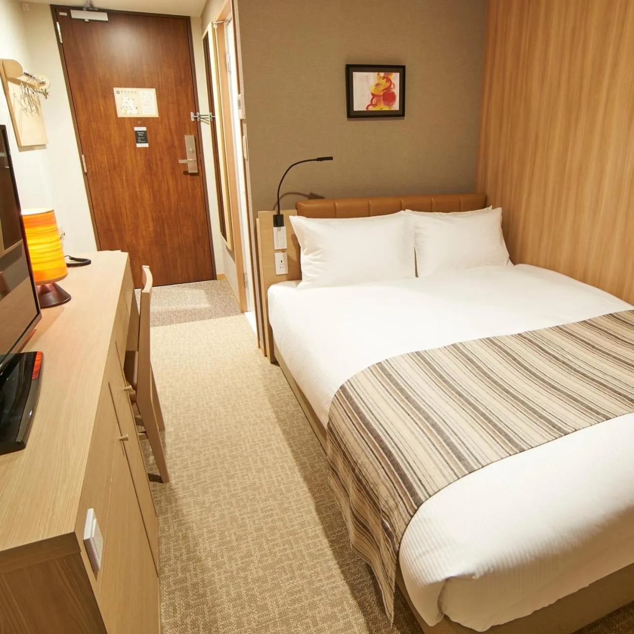 Bed in QuintessaHotel TokyoHaneda Comic&Books