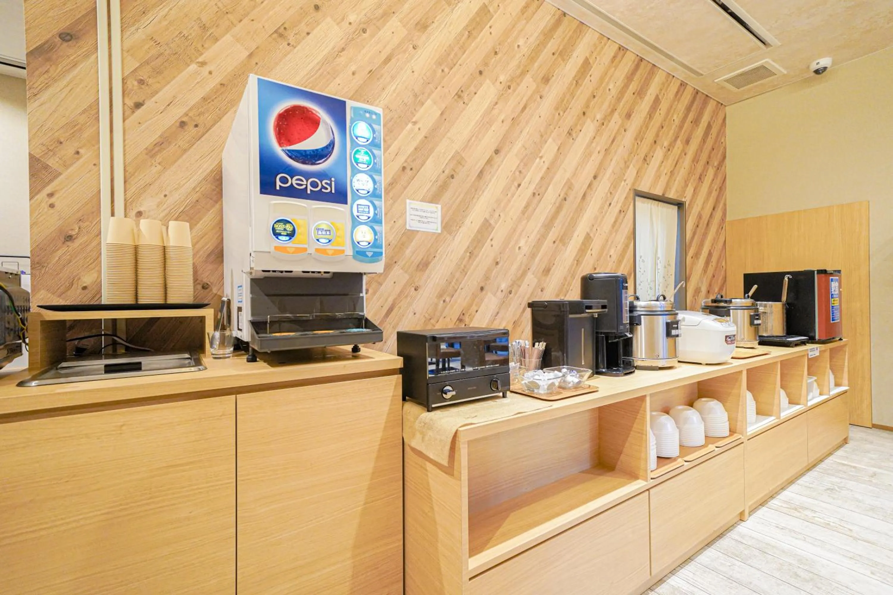 Communal lounge/ TV room in QuintessaHotel TokyoHaneda Comic&Books