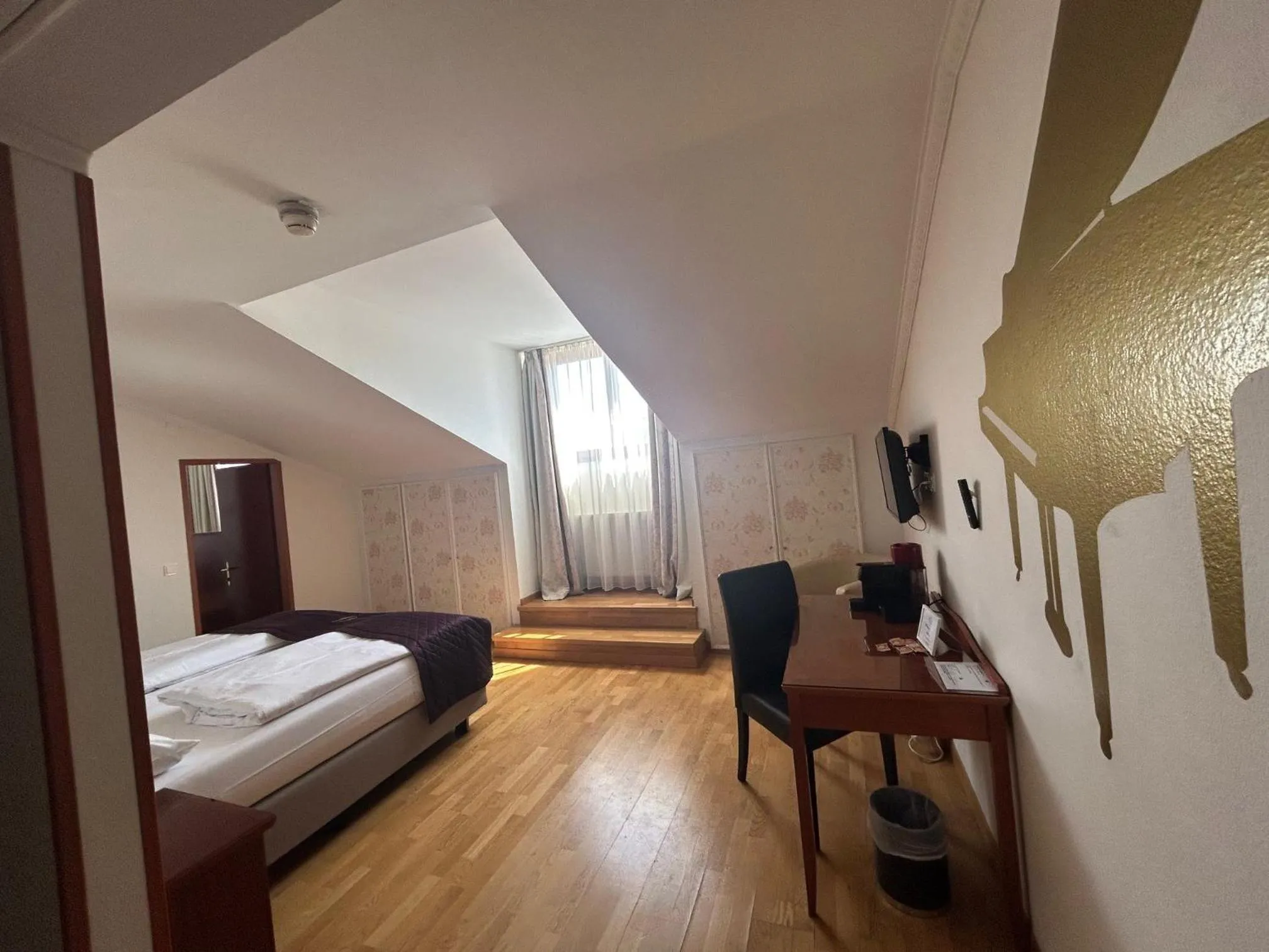 Living room, Bed in Hotel Am Schubertring