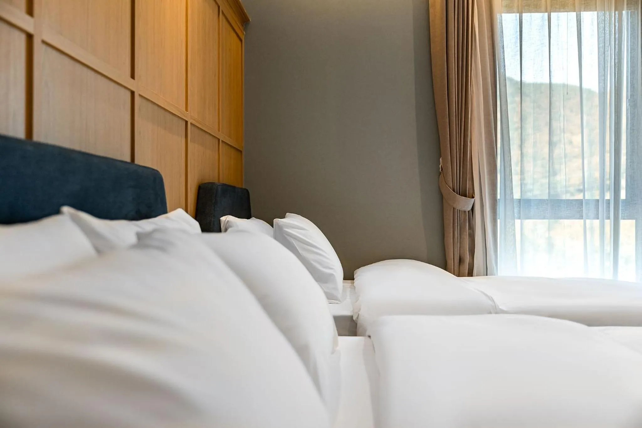 Bed in Brown Dot Hotel Signature