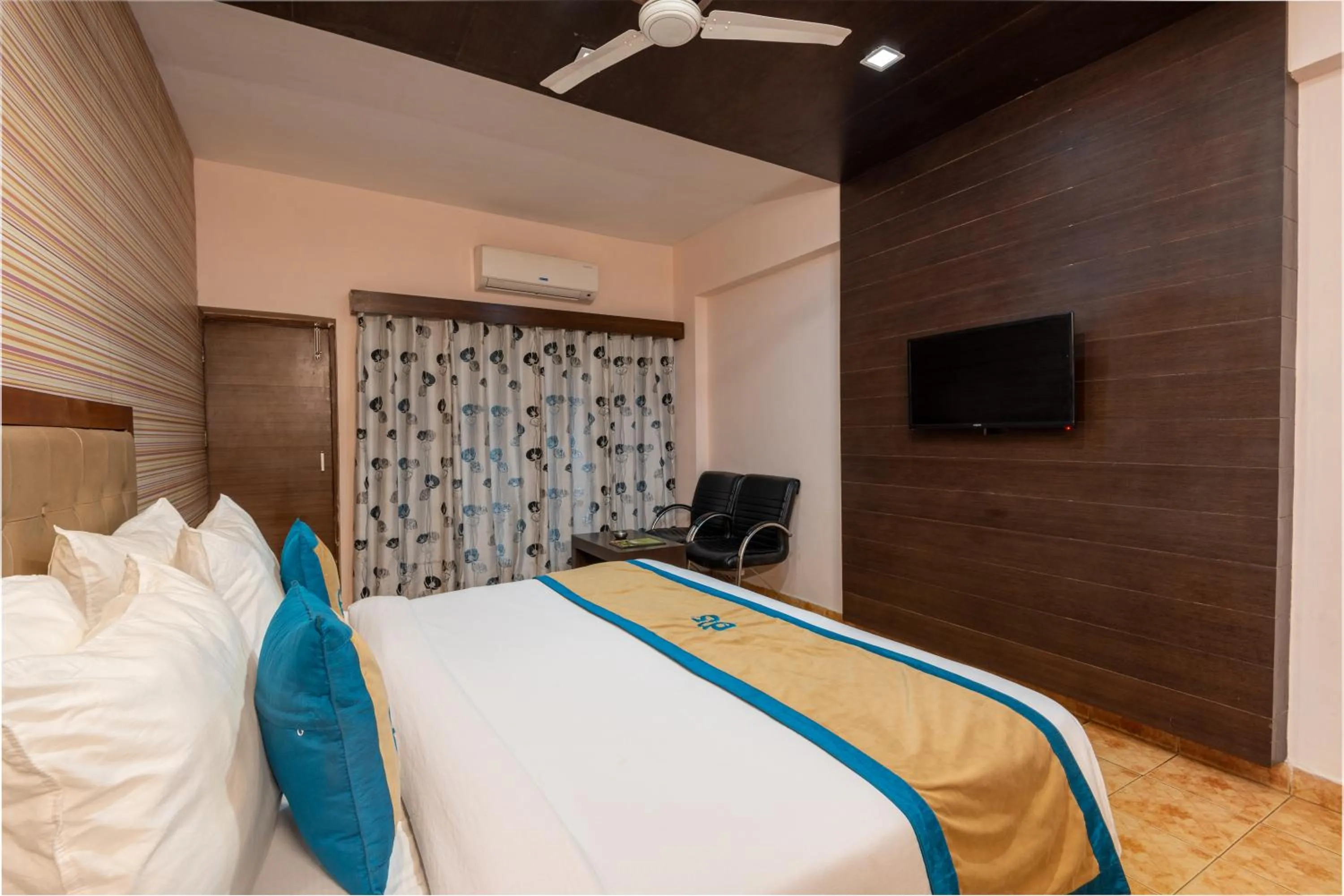 Bed in Spring Valley Resorts by DLS Hotels