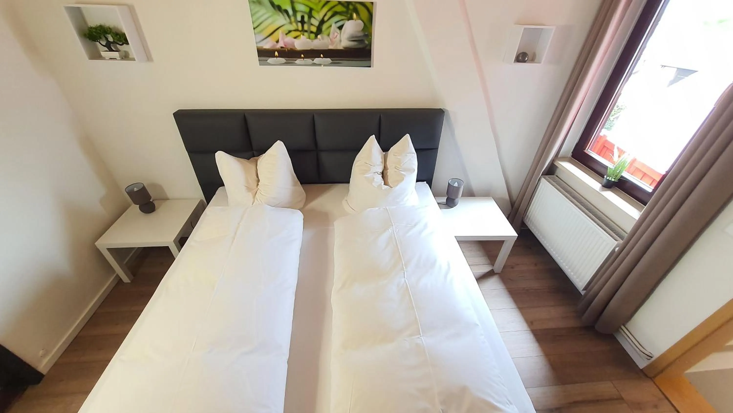 Bed in Hotel Schneiderhof