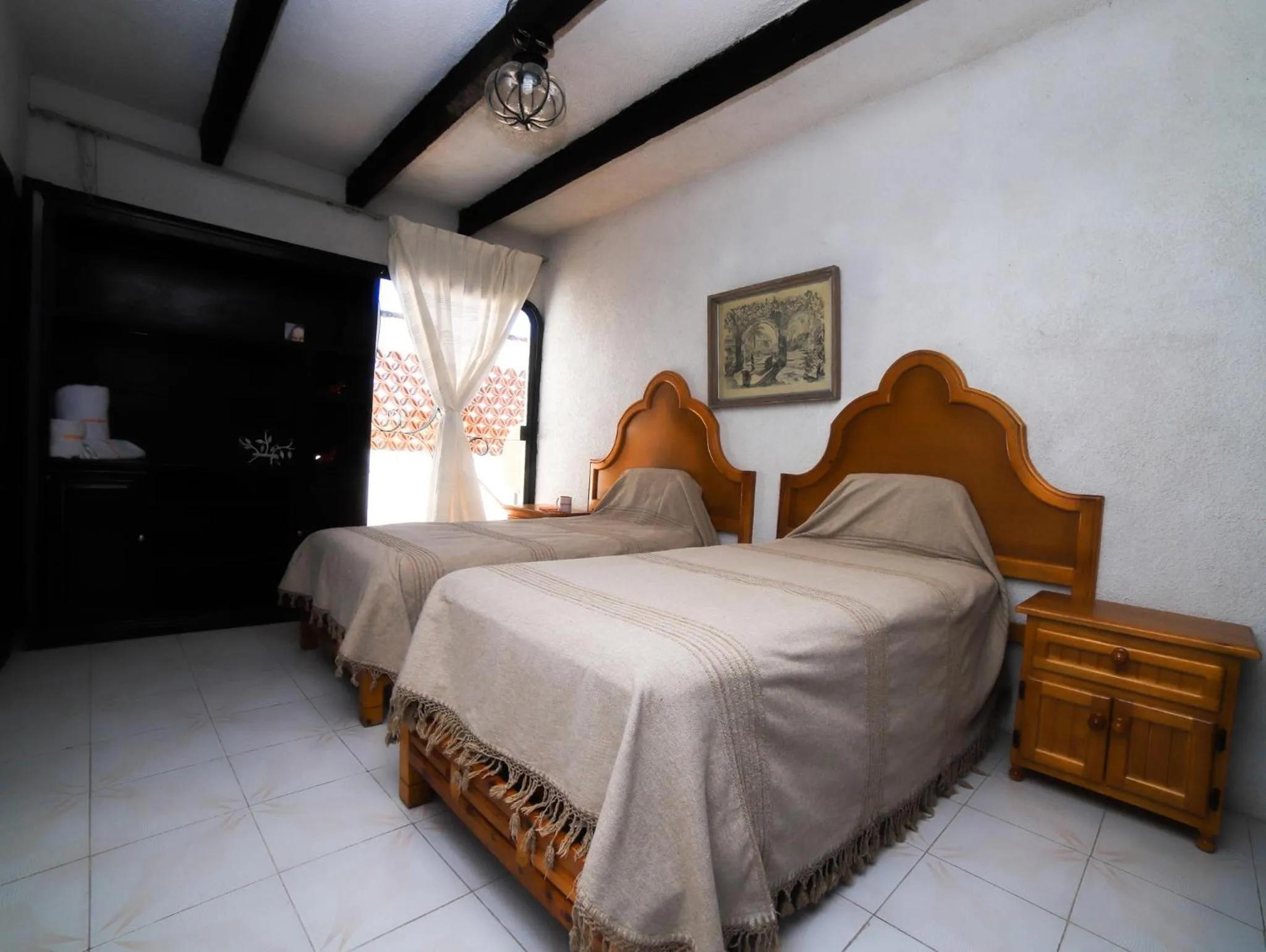 Photo of the whole room, Bed in Casa de las Cruces Taxco