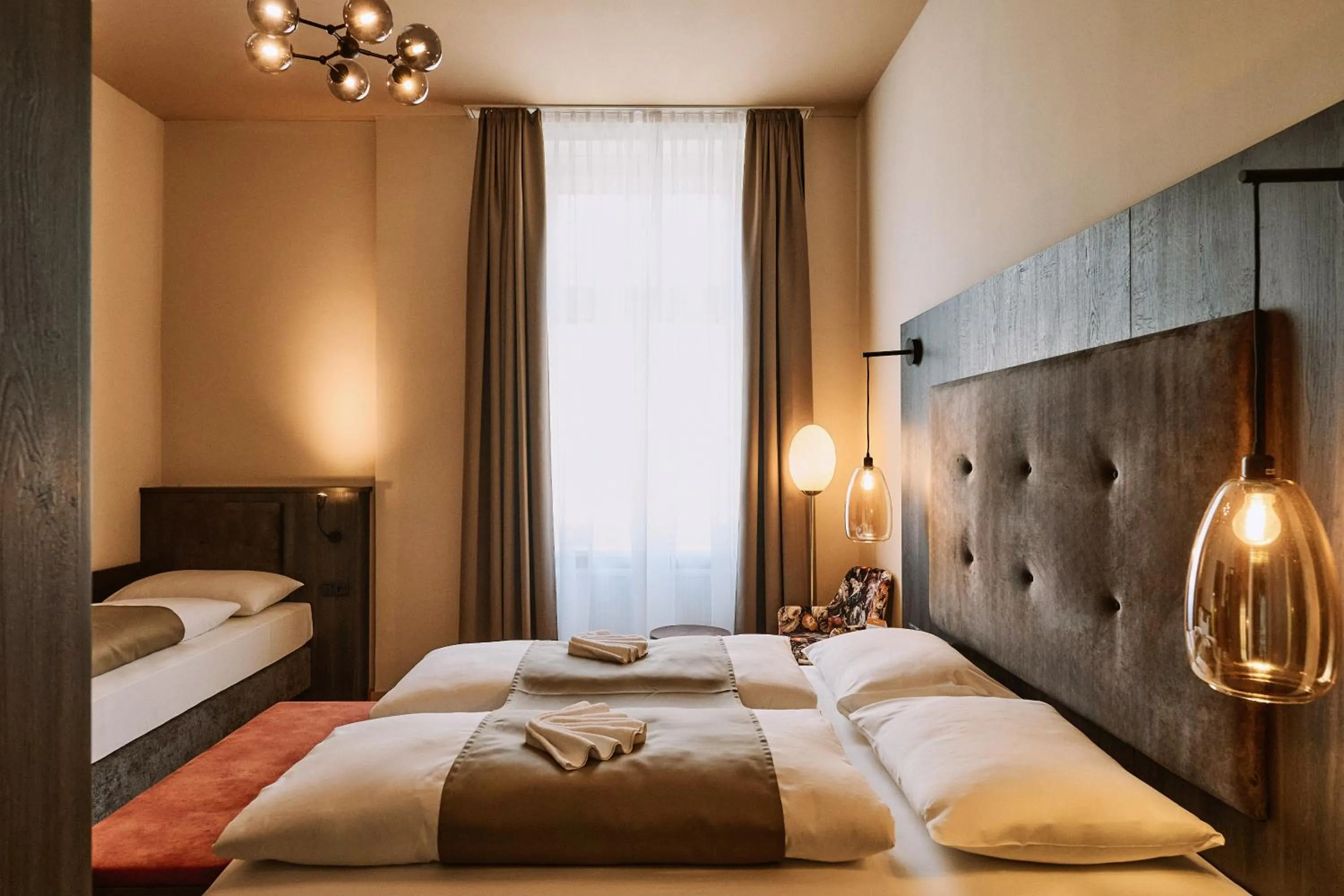 Bed in Urban Rooms Rathaus - Self Check-In