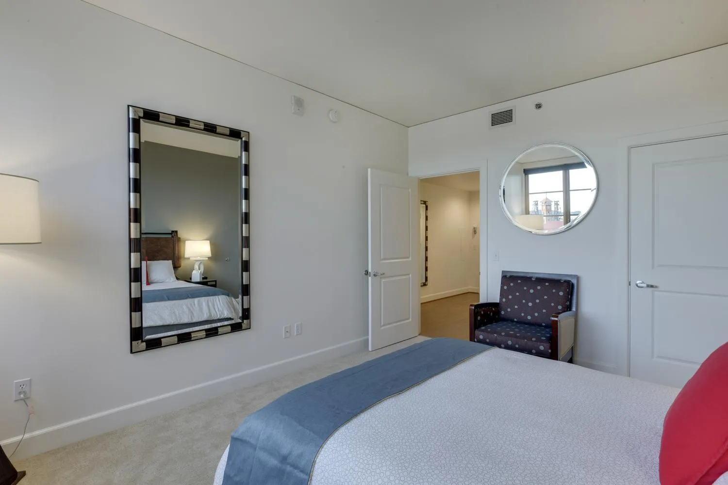 Bed in Renu Suites at The Burlington Portland