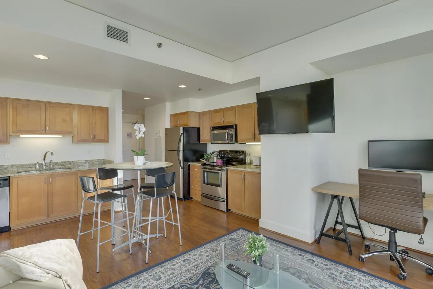 TV and multimedia in Renu Suites at The Burlington Portland