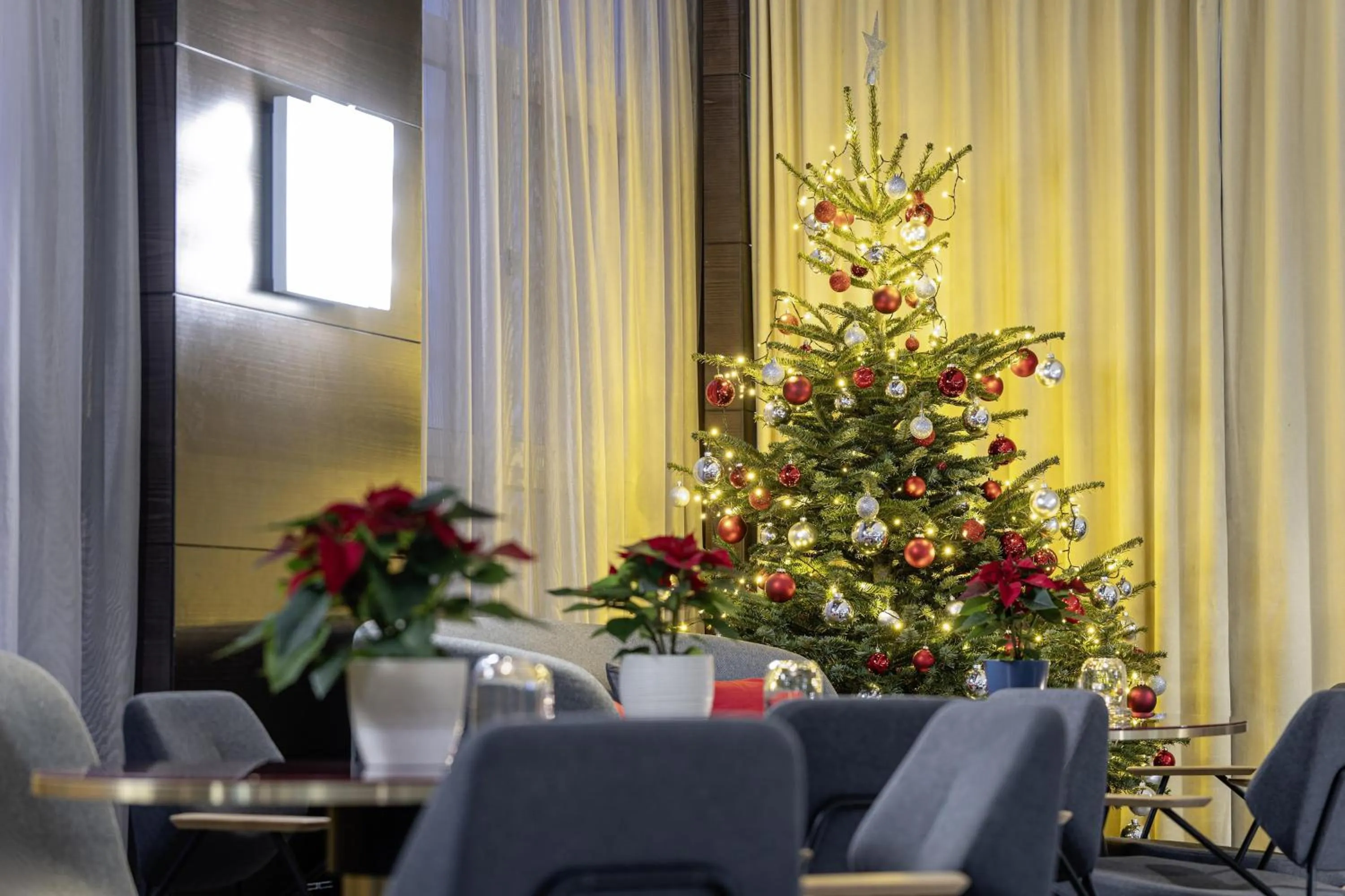 Lobby or reception in NH Collection Salzburg City