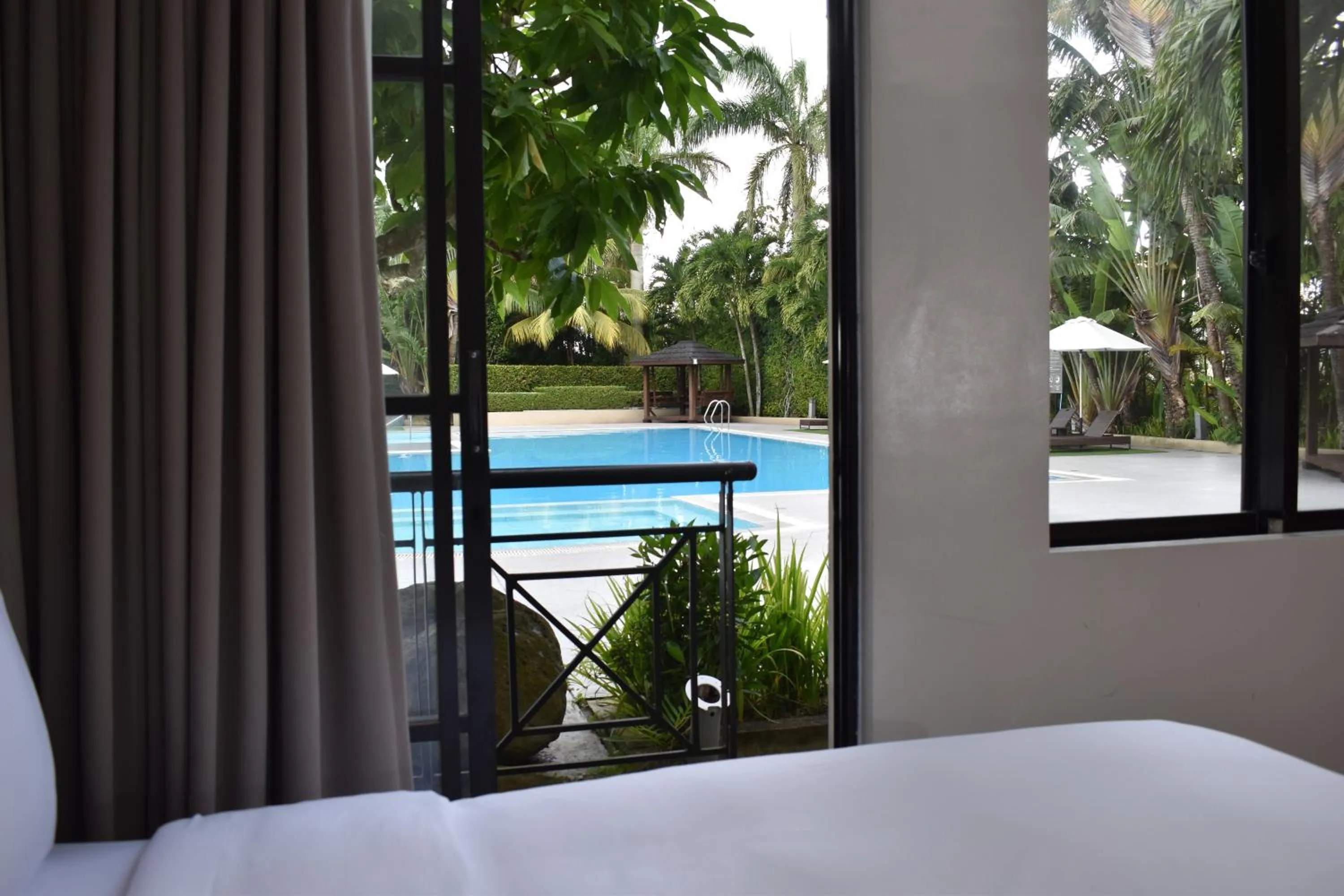 View (from property/room), Bed in Holiday Inn & Suites Batangas LimaPark by IHG