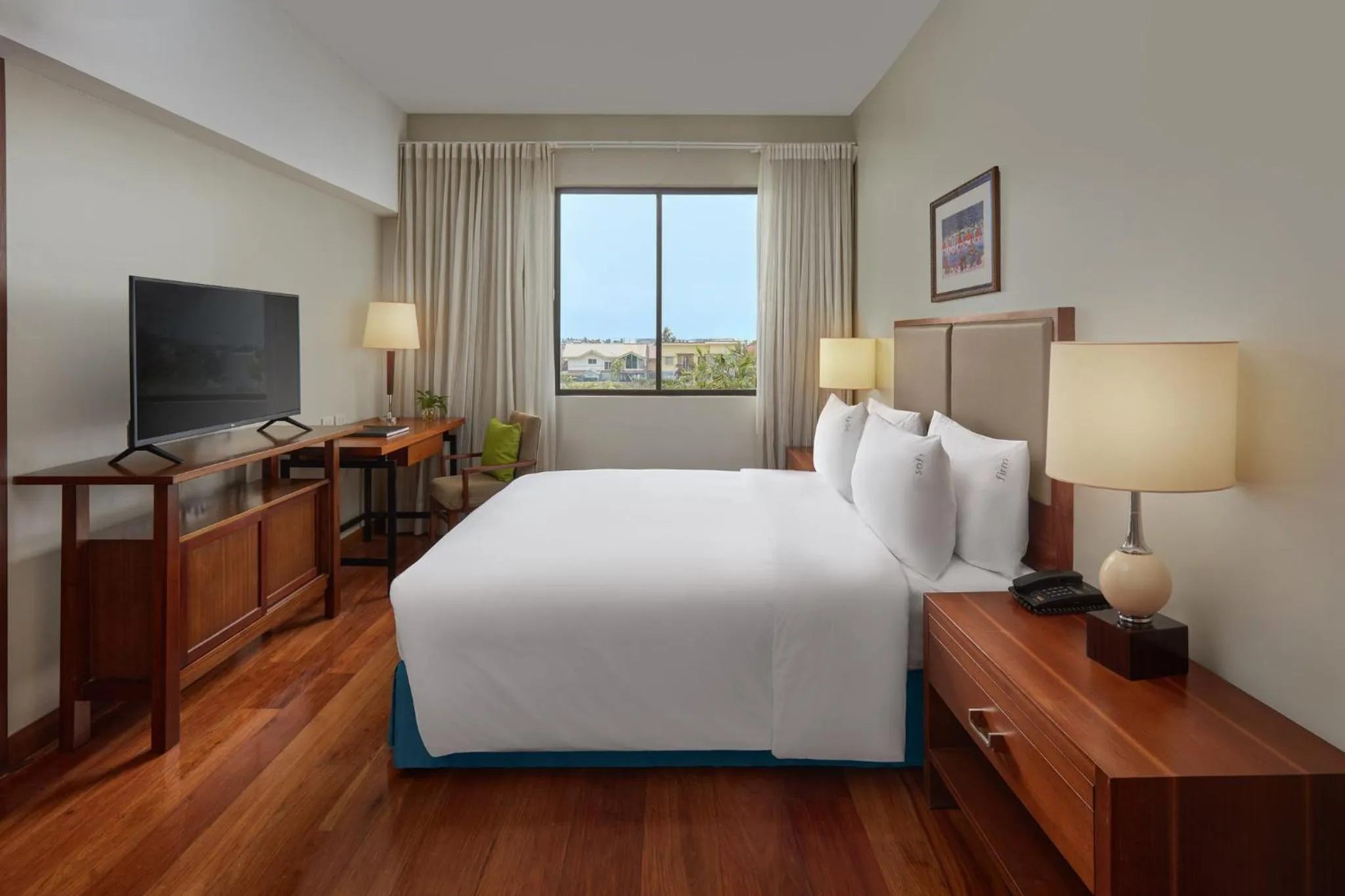 Photo of the whole room, Bed in Holiday Inn & Suites Batangas LimaPark by IHG