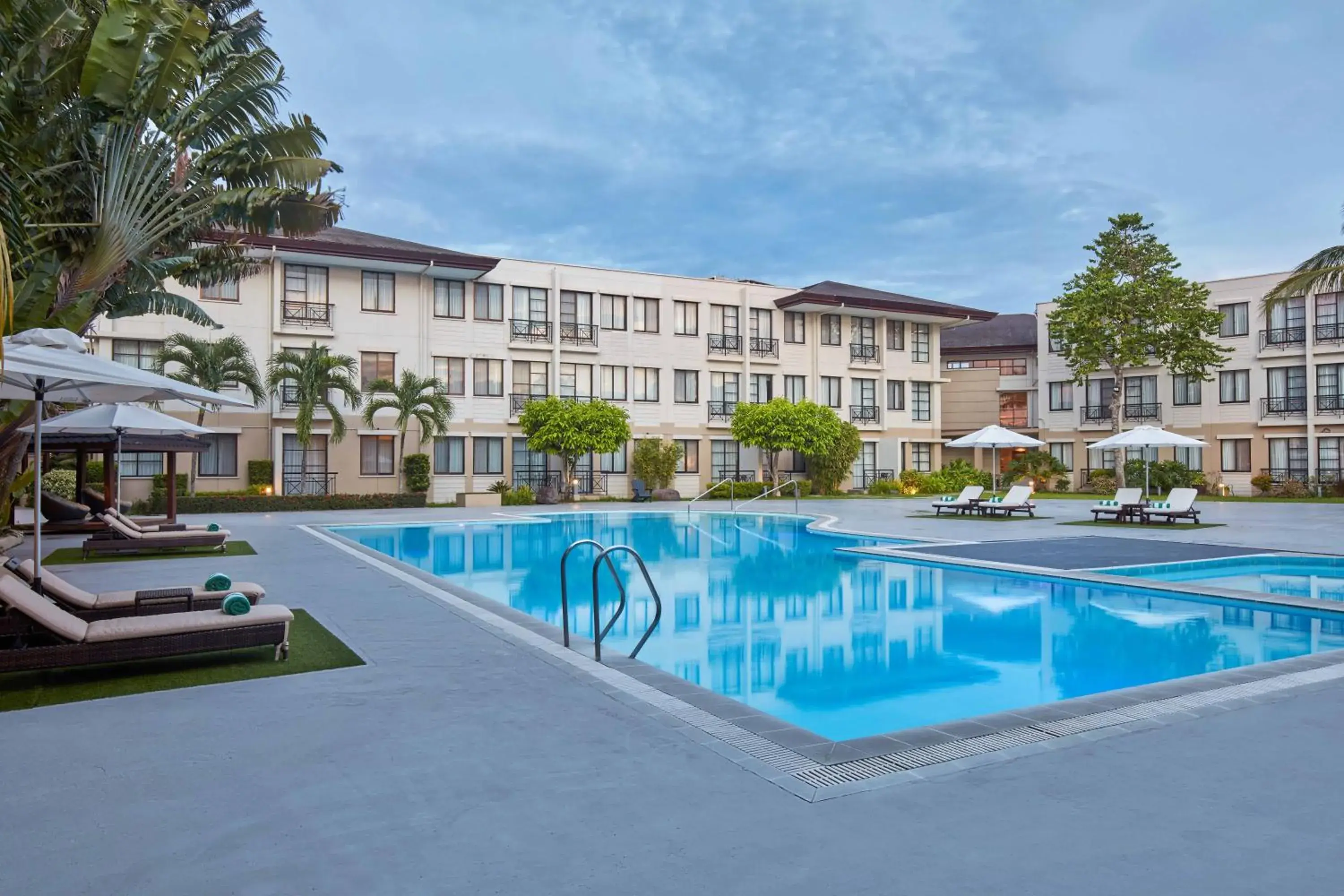 Pool view in Holiday Inn & Suites Batangas LimaPark by IHG Pool view in Holiday Inn & Suites Batangas LimaPark by IHG