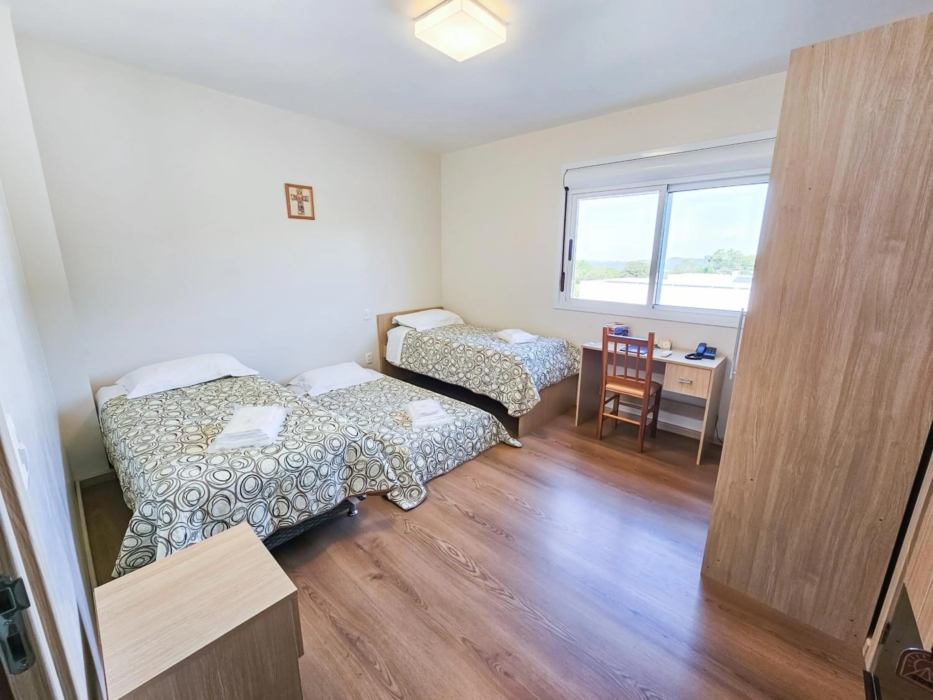 Bed in Pousada Bom Pastor