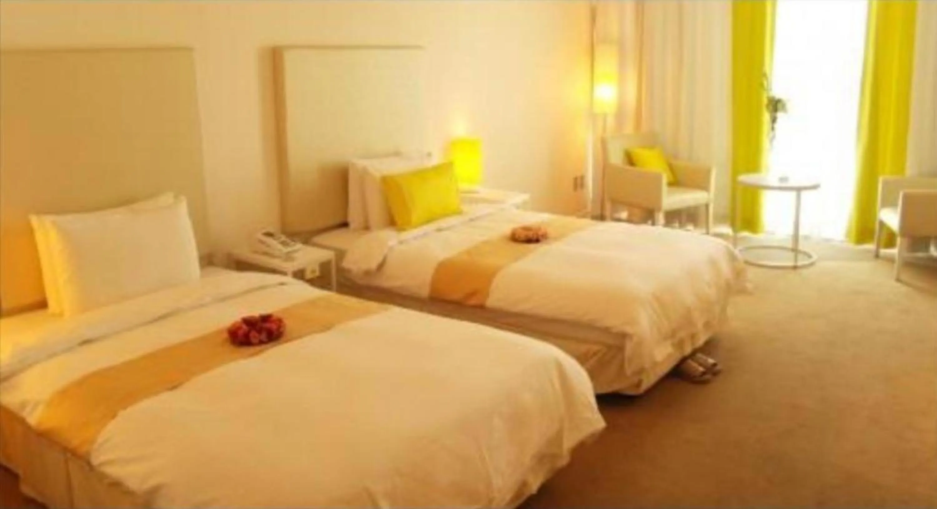 Bed in Ecograd Hotel