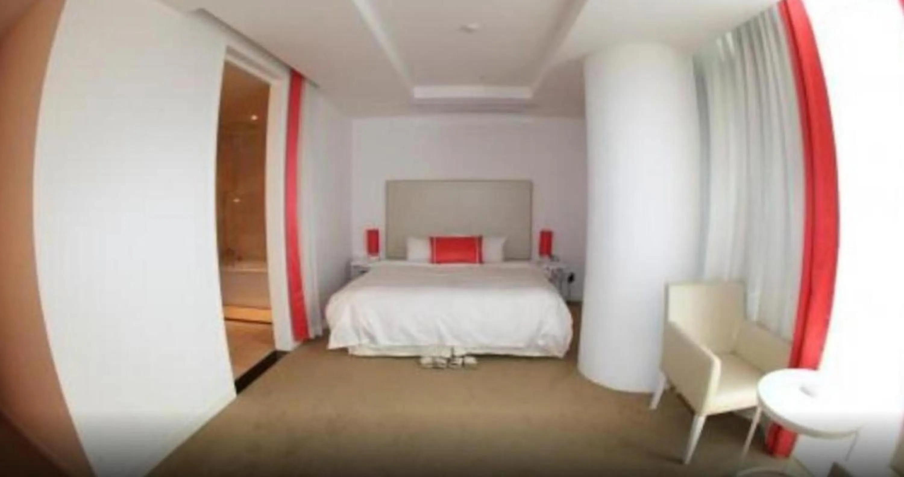 Bed in Ecograd Hotel