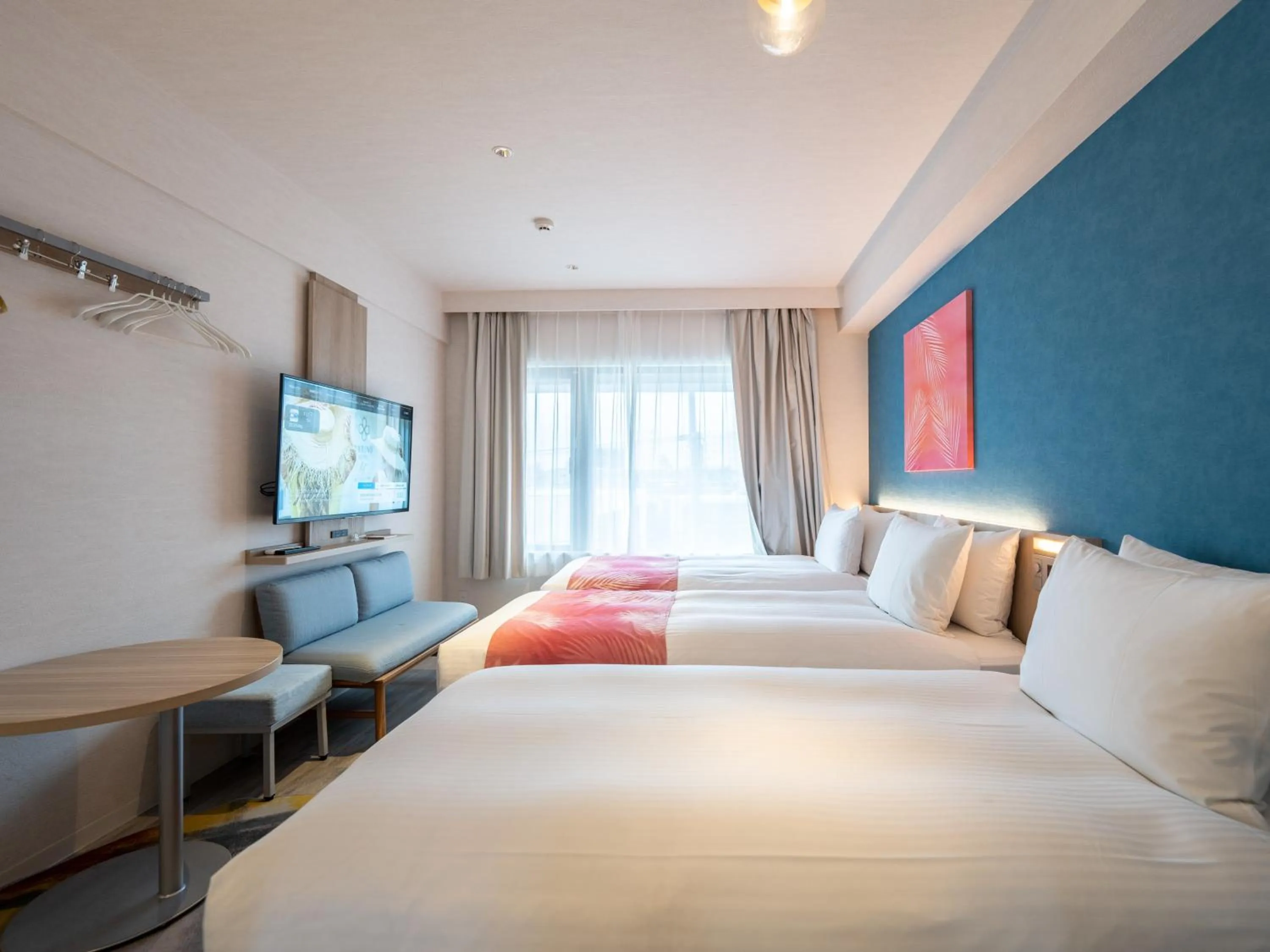 Photo of the whole room, Bed in Tabino Hotel lit Miyakojima