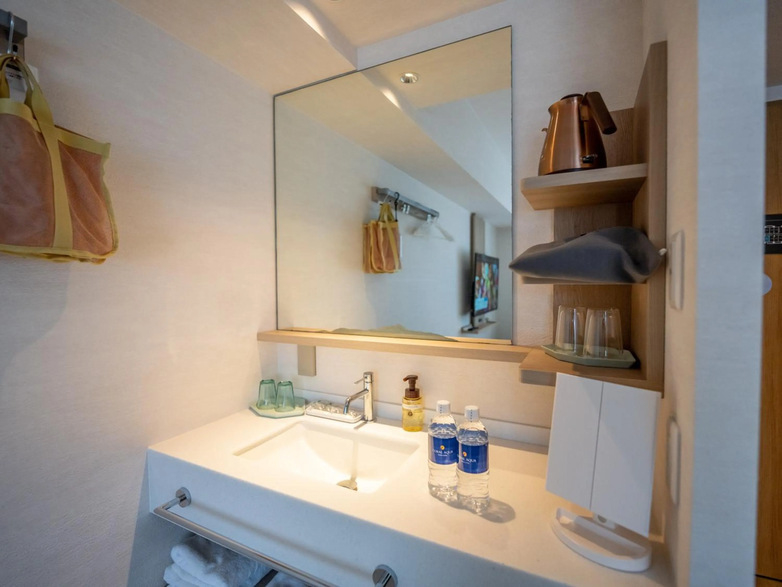 Photo of the whole room in Tabino Hotel lit Miyakojima