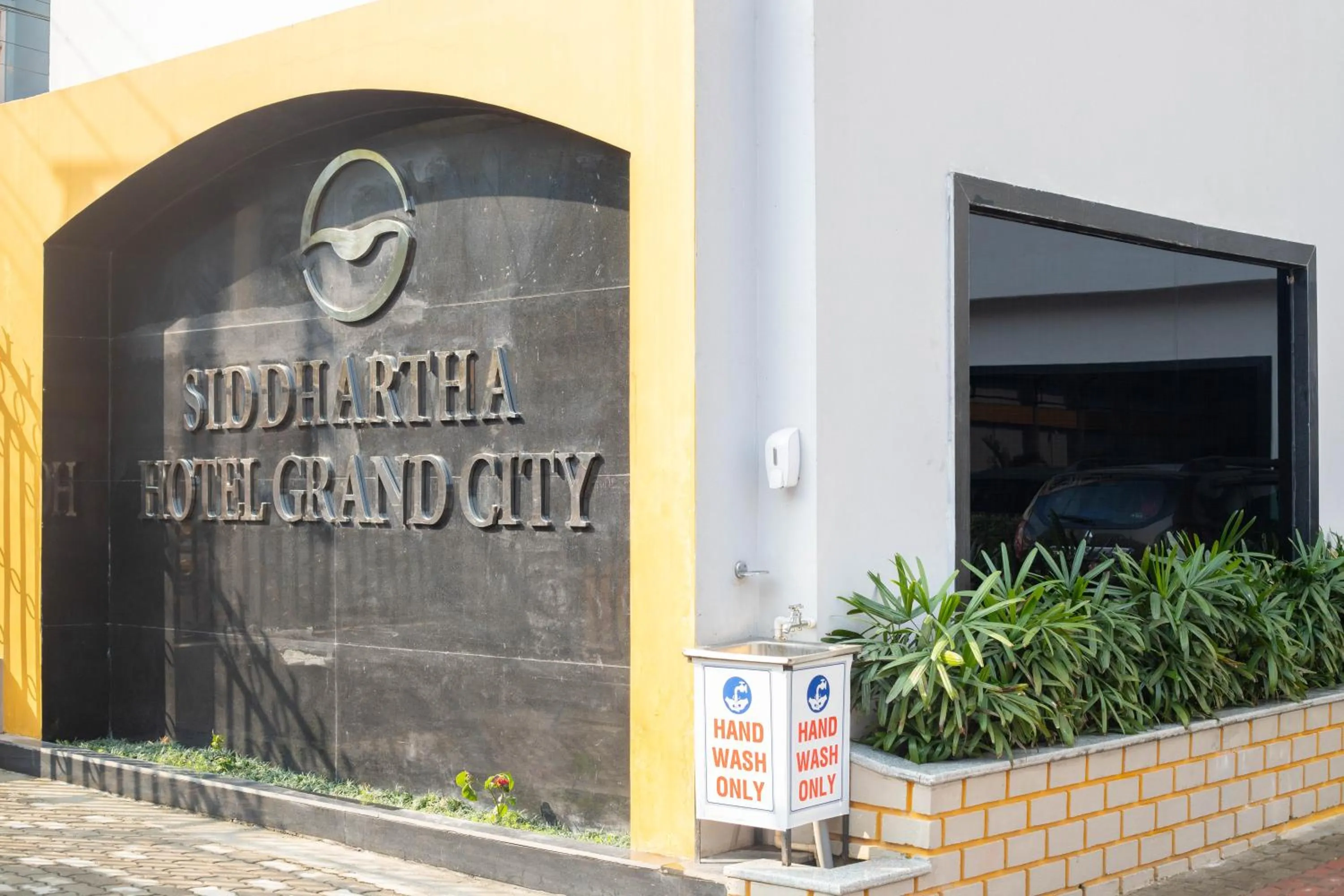 Property logo or sign in Siddhartha Hotel Grand City