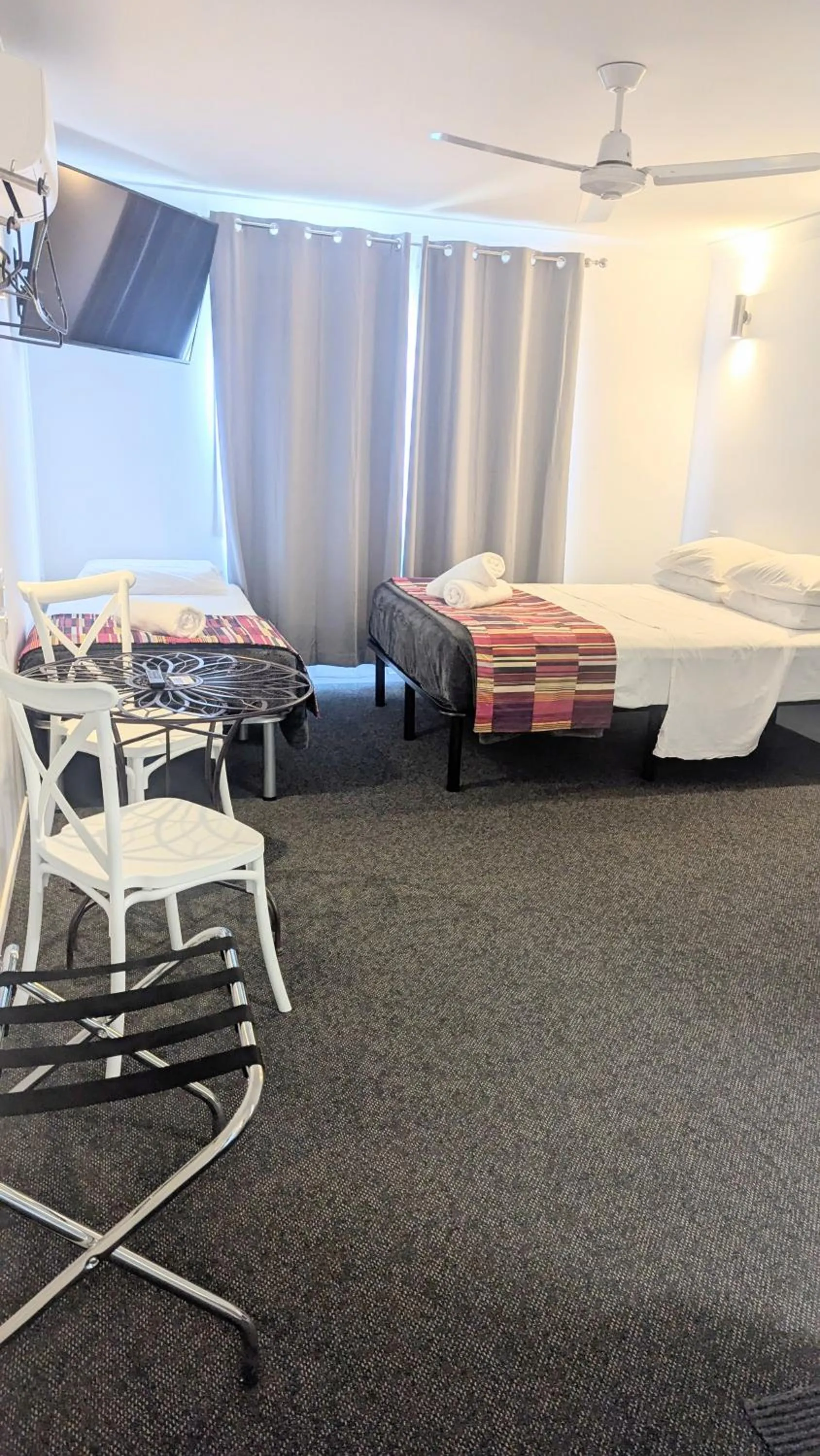 Bed in PROSERPINE MOTOR LODGE