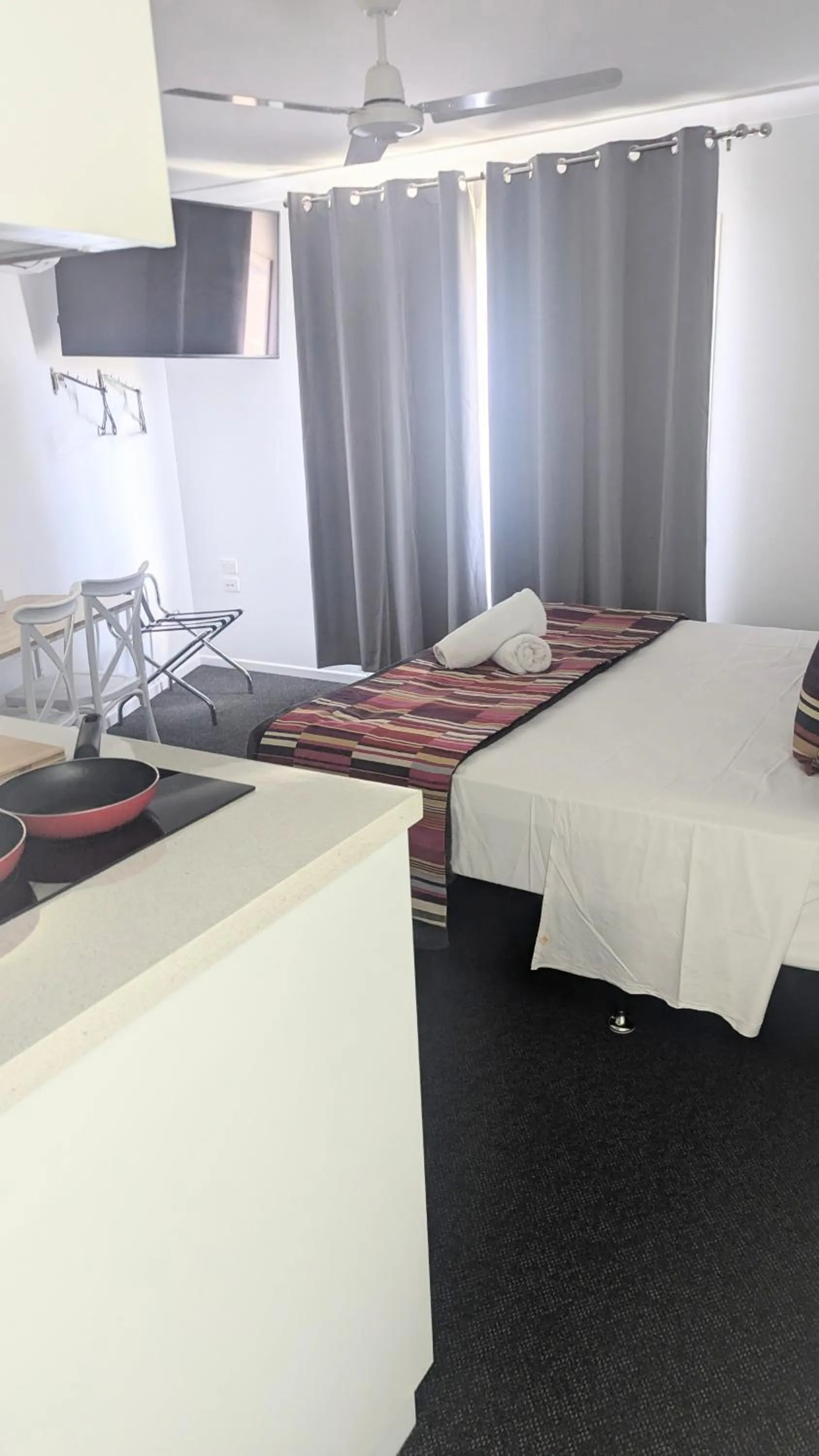 Bed in PROSERPINE MOTOR LODGE