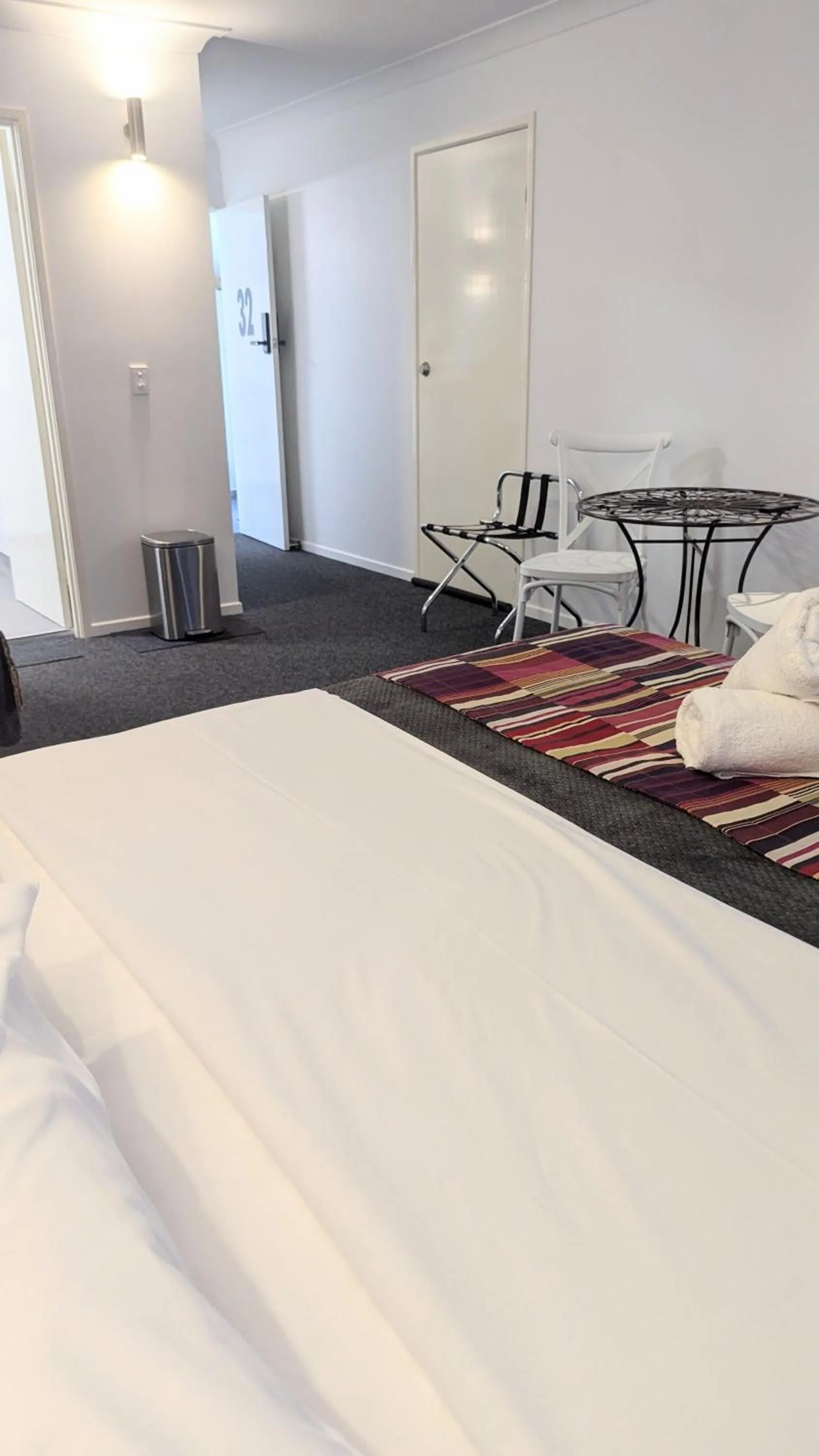 Bed in PROSERPINE MOTOR LODGE