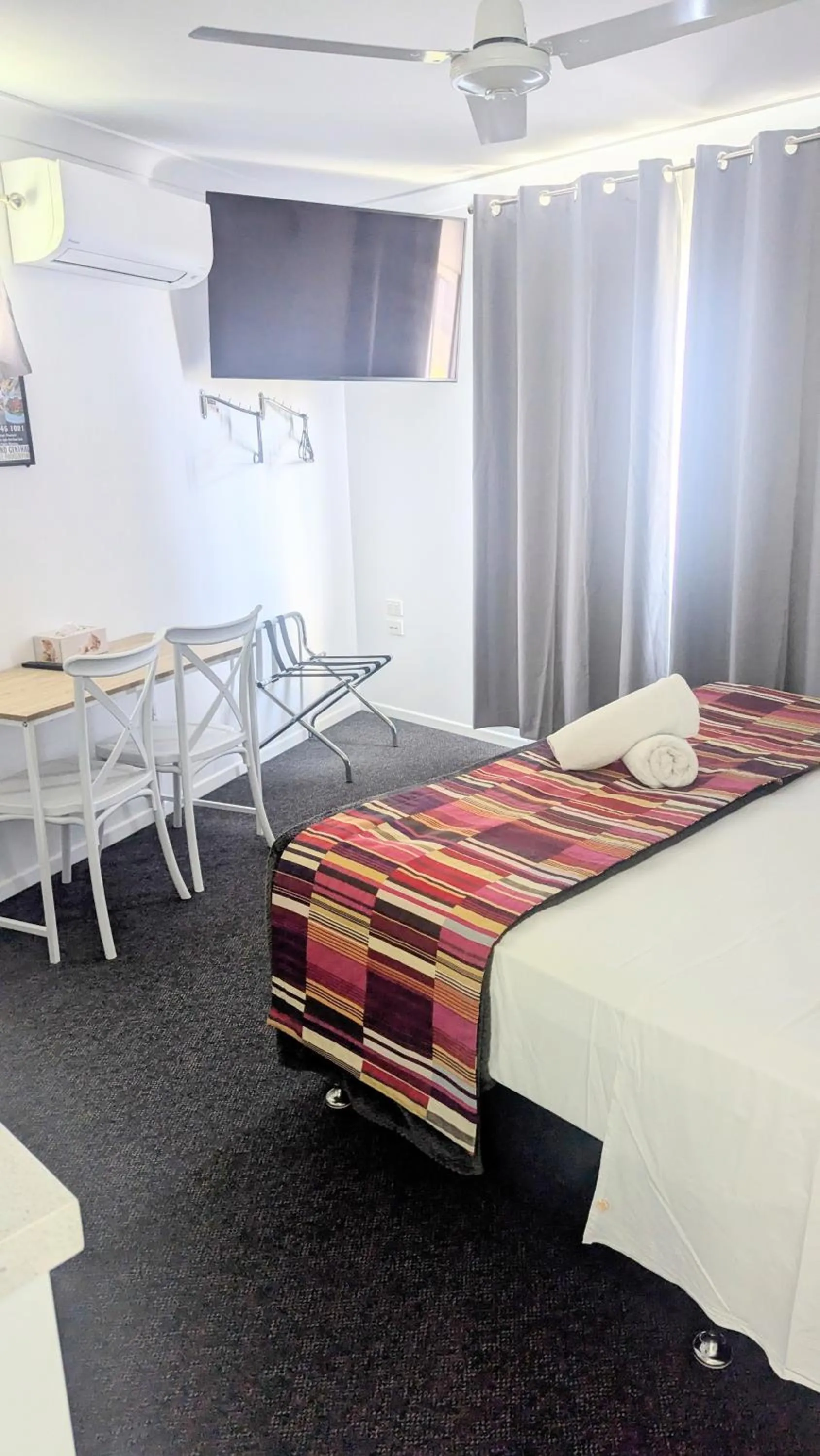 Bed in PROSERPINE MOTOR LODGE