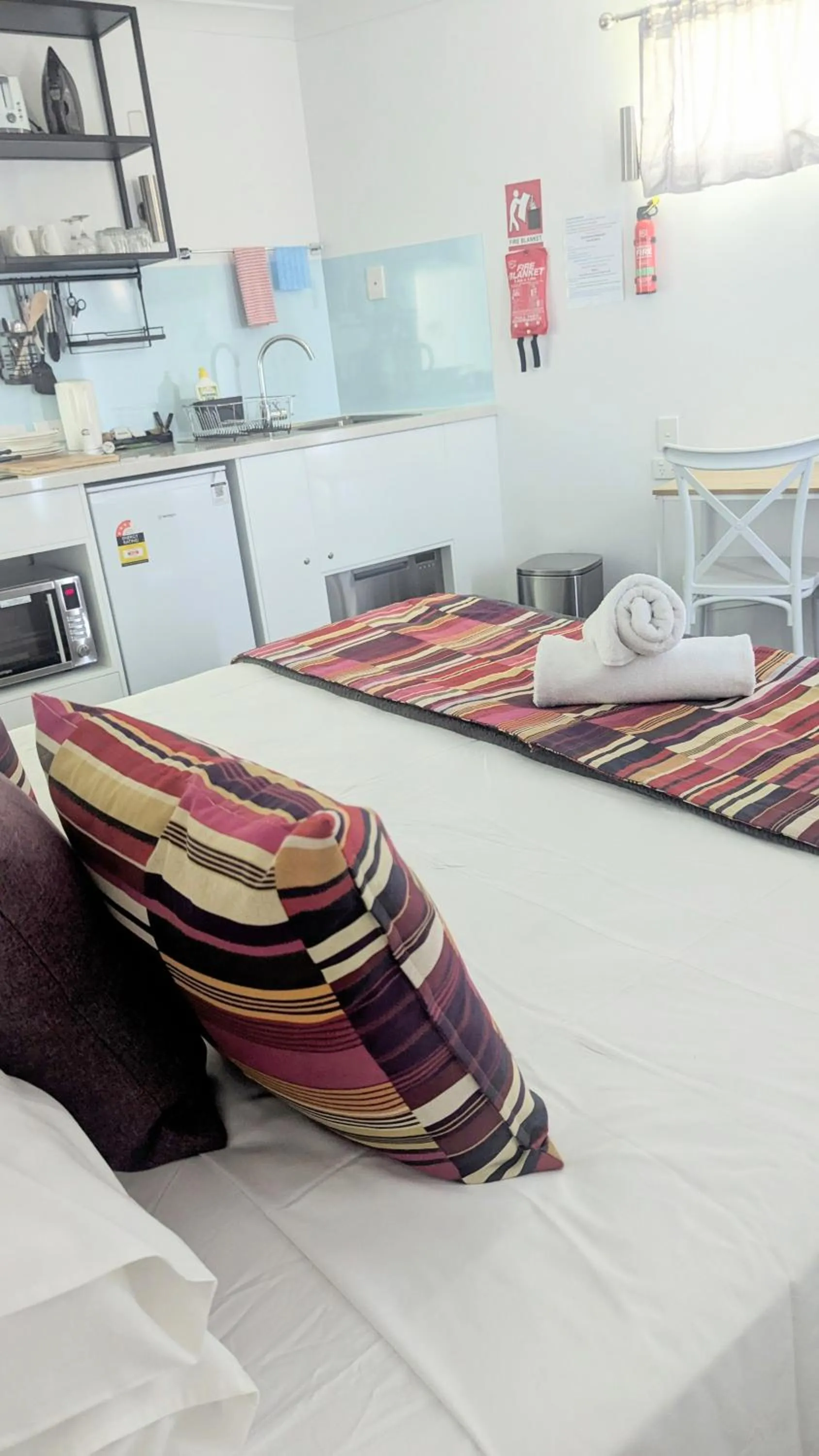 Bed in PROSERPINE MOTOR LODGE