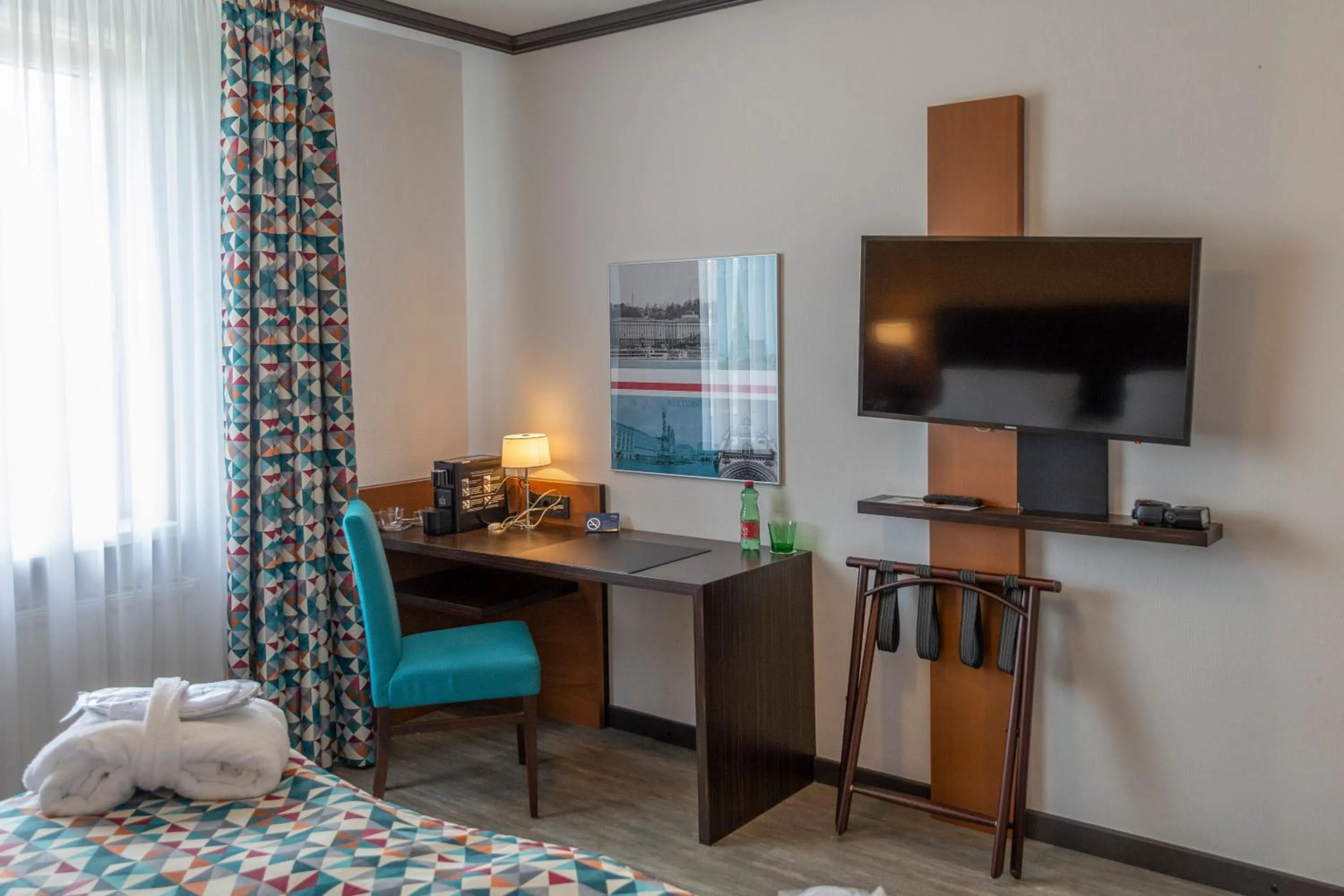 Photo of the whole room, Bed in Trans World Hotel Donauwelle