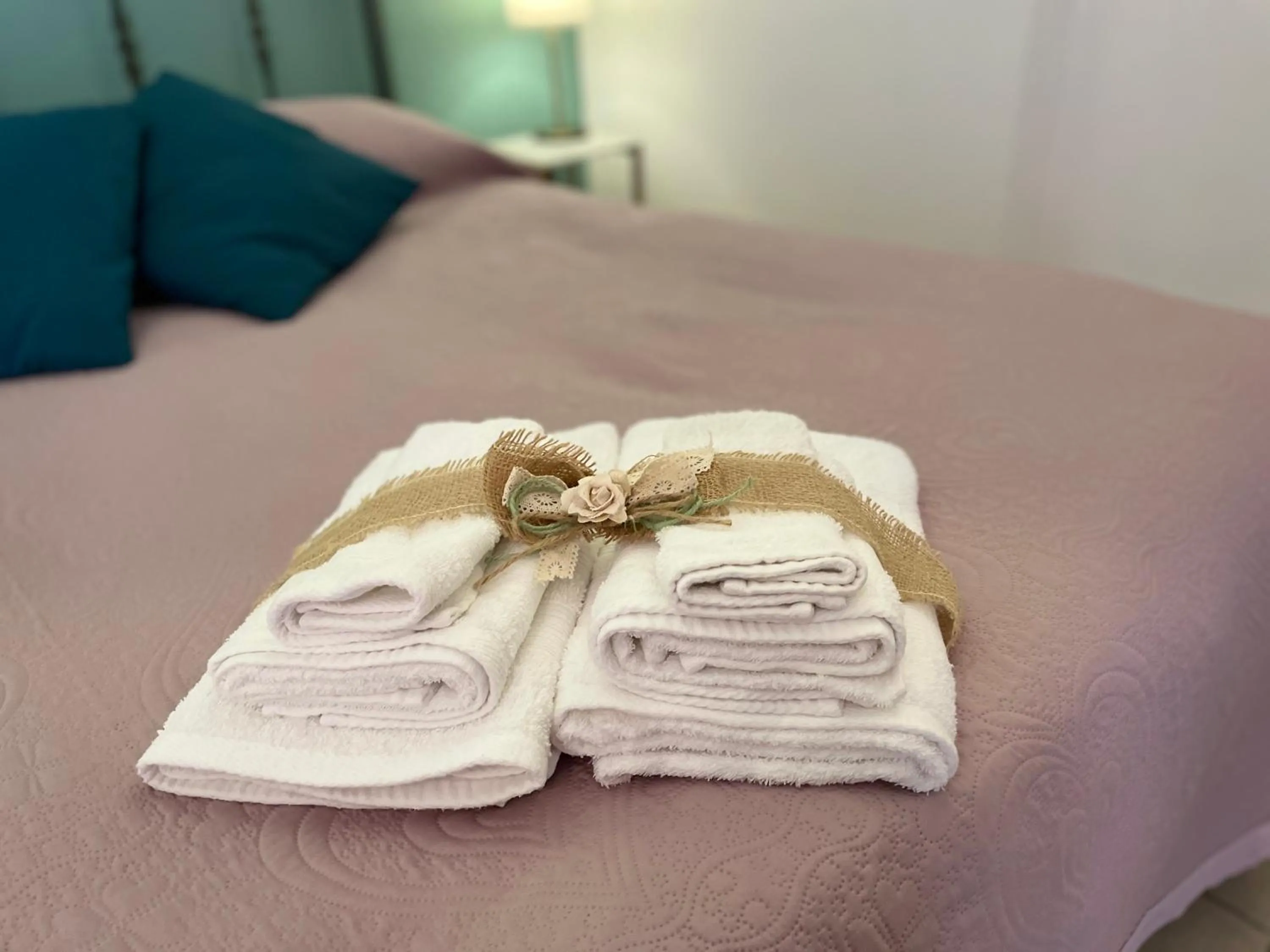 Decorative detail, Bed in Dimora Bellini Apartment and Rooms