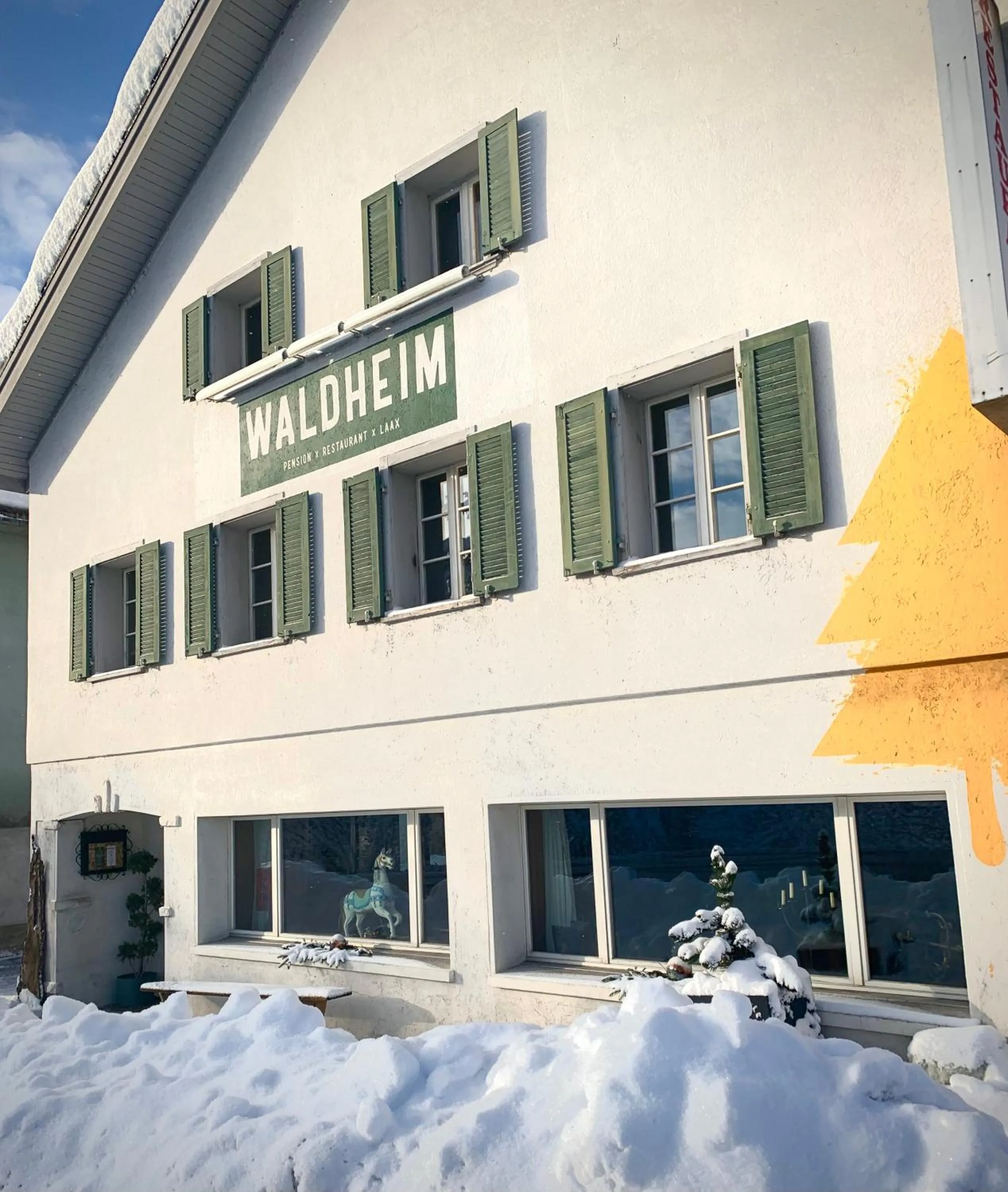Property building in Waldheim Laax Pension