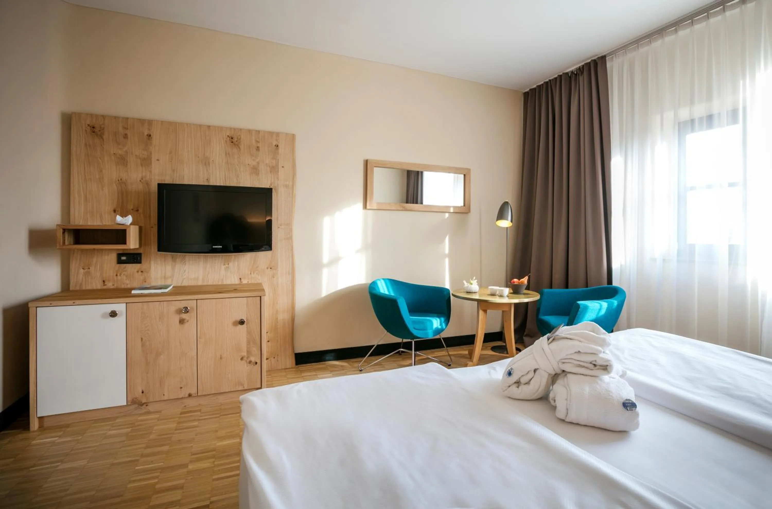 Bedroom, Bed in Rogner Bad Blumau