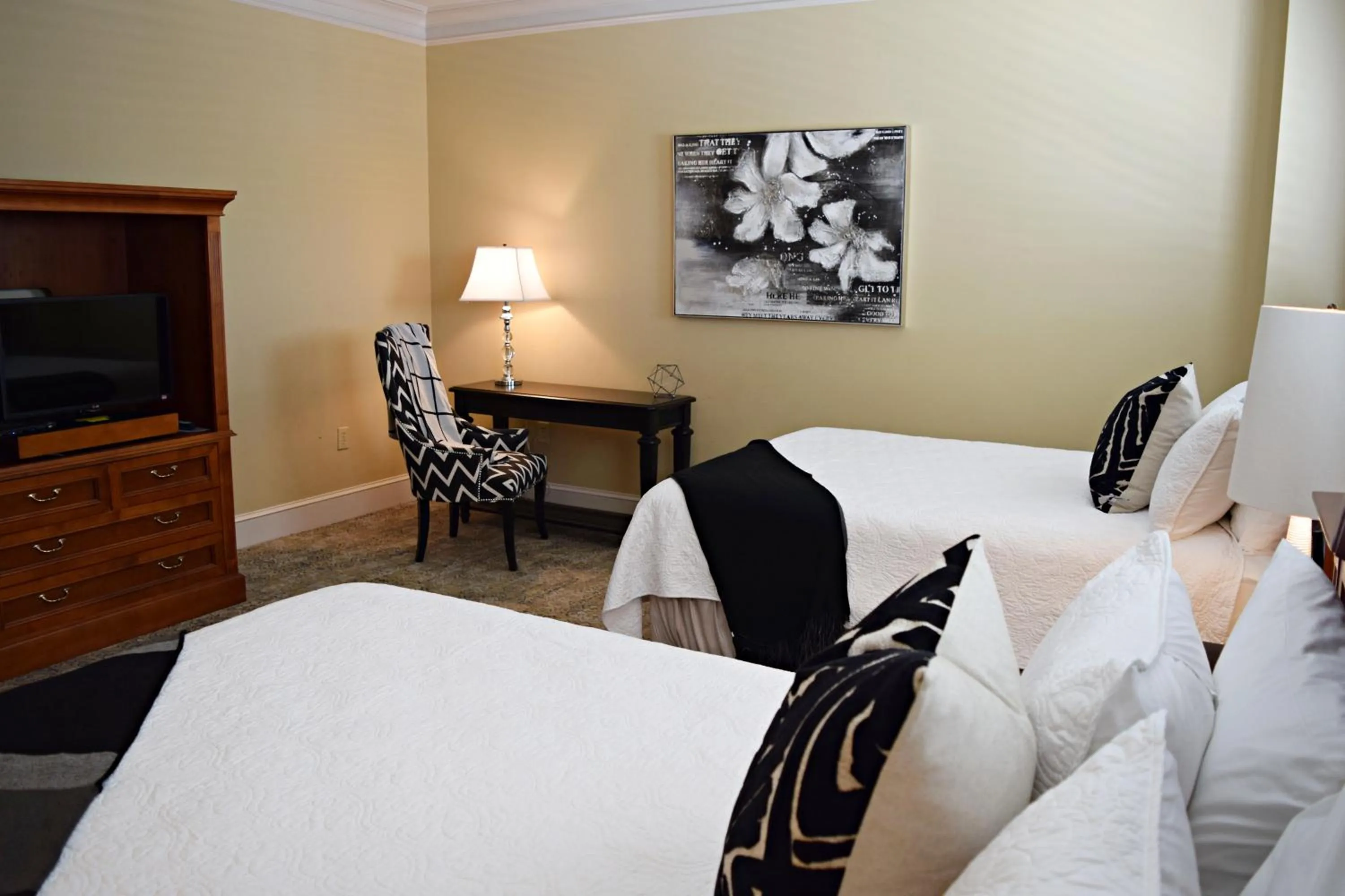 Photo of the whole room, Bed in JH Adams Inn, Trademark Collection by Wyndham