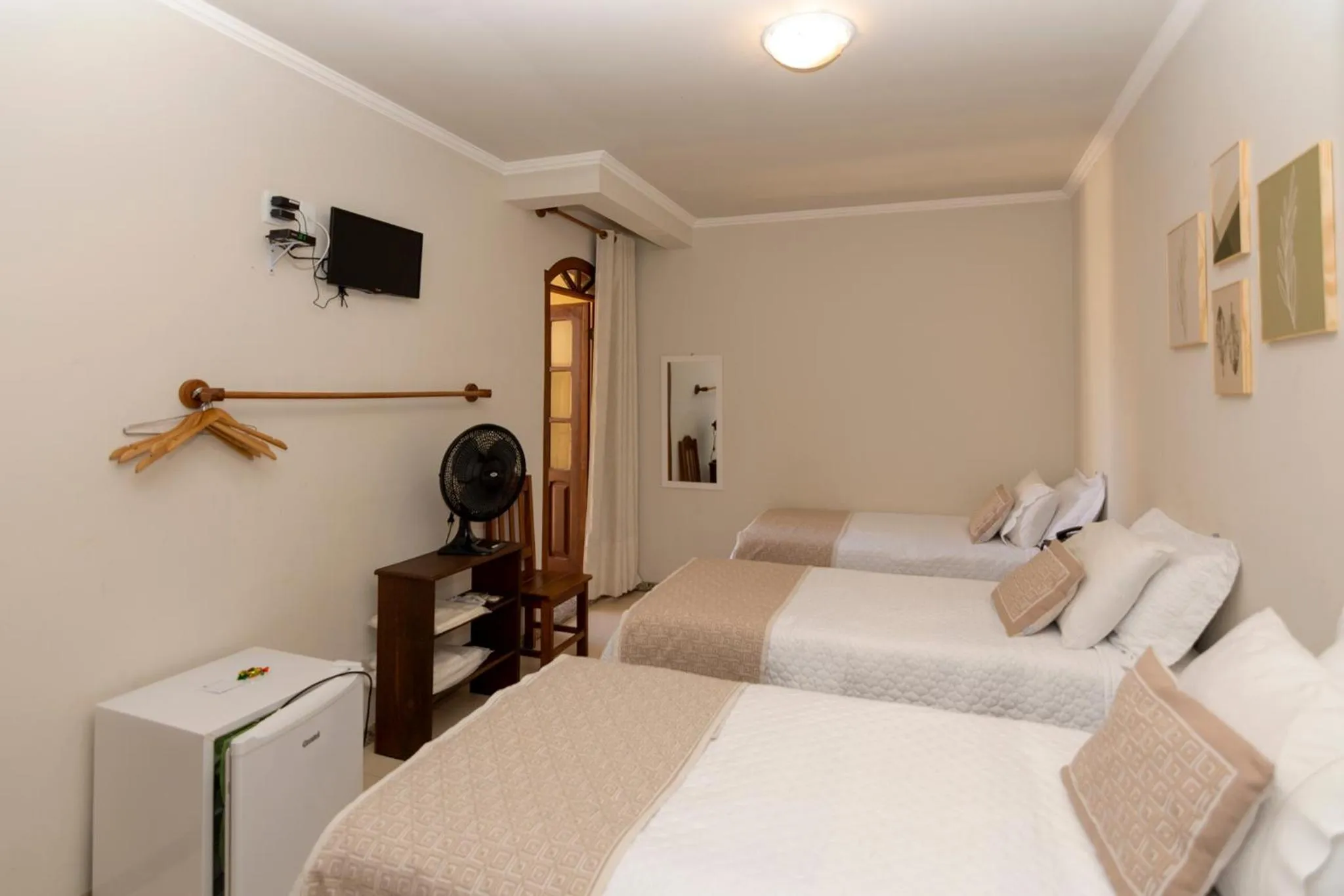 Bed in POUSADA CAPIM LIMÃO