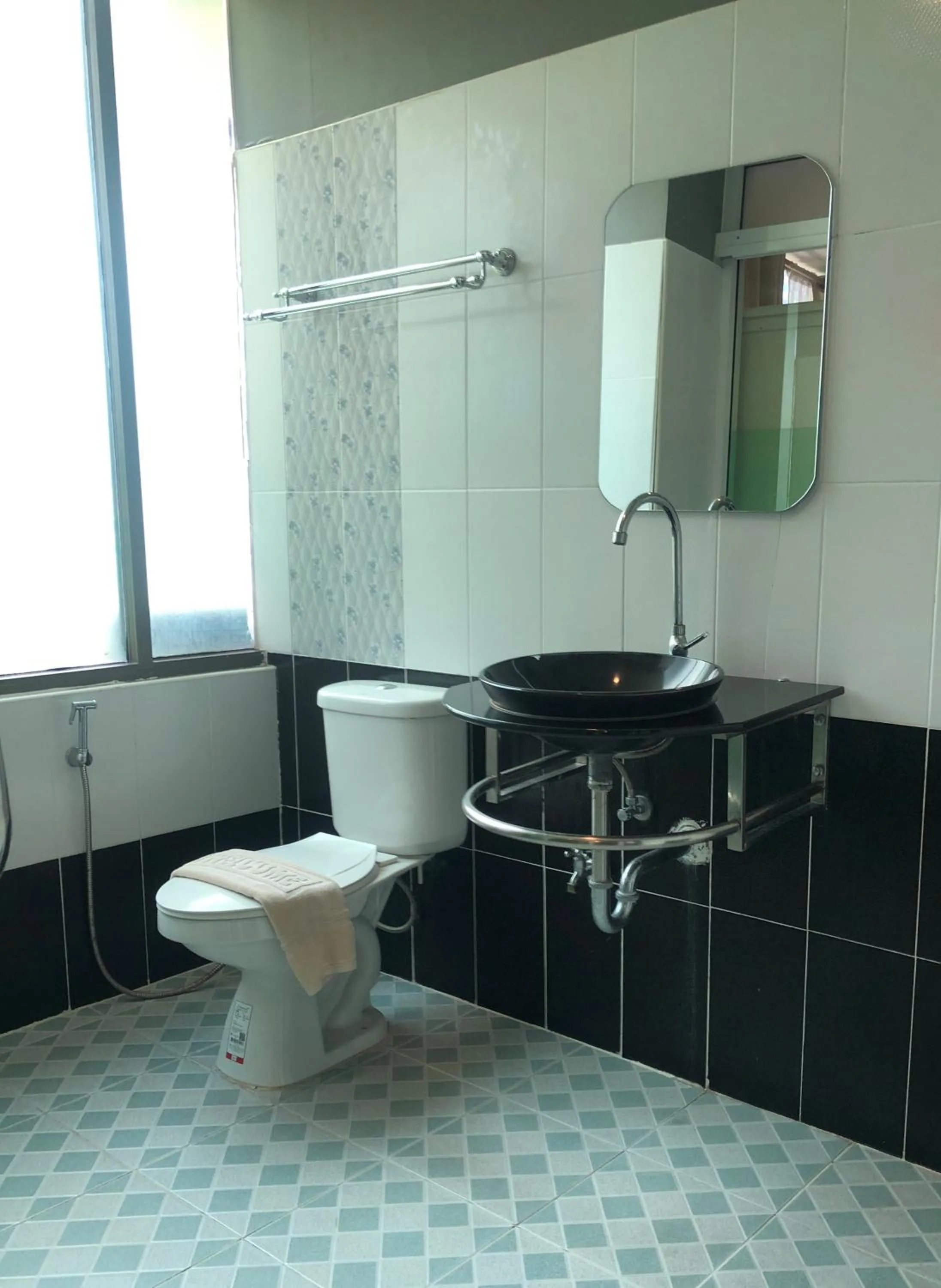 Bathroom in Anandpura Riverside Hotel