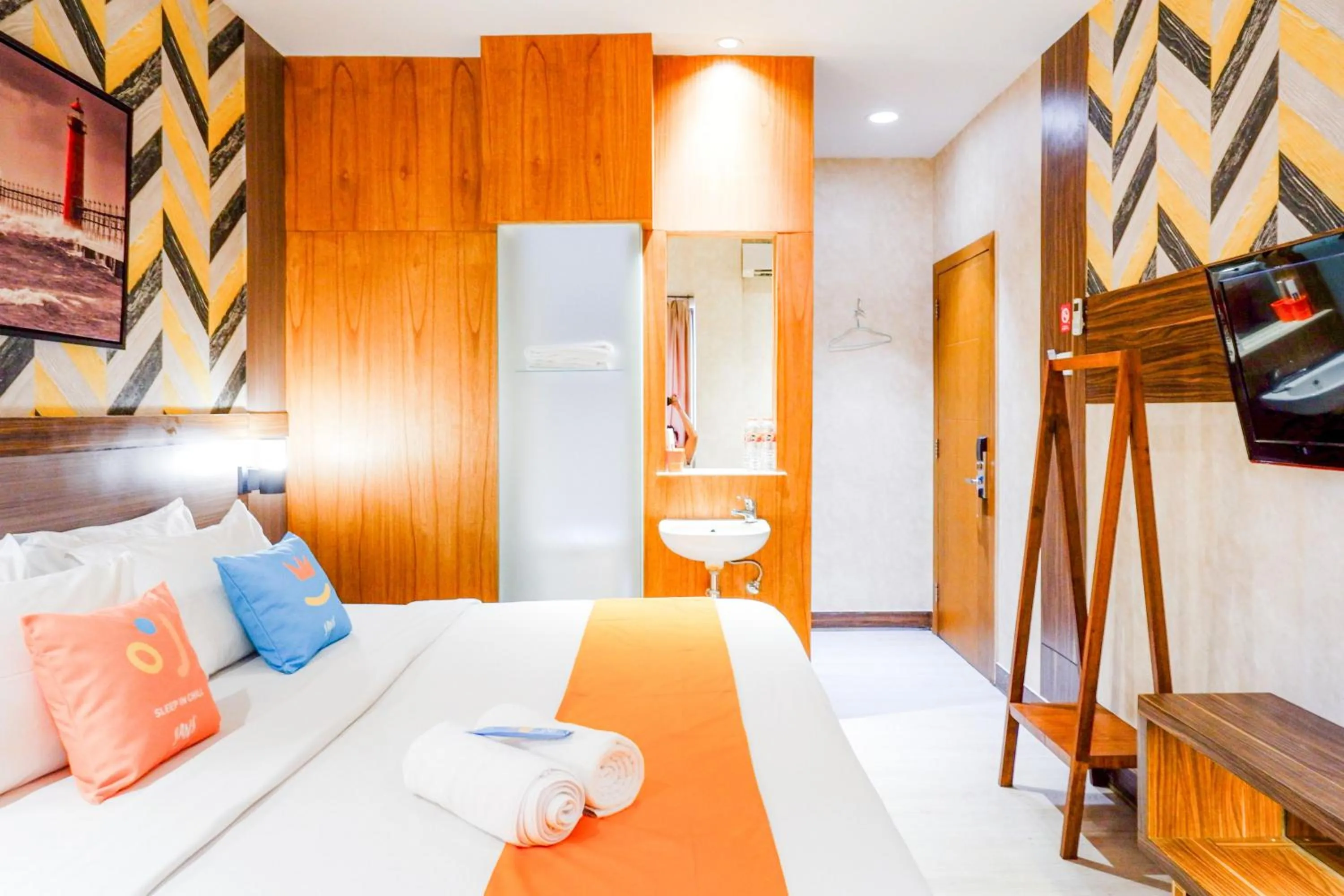 Bedroom, Bed in Sans Hotel Ekkon Yogyakarta by Reddoorz