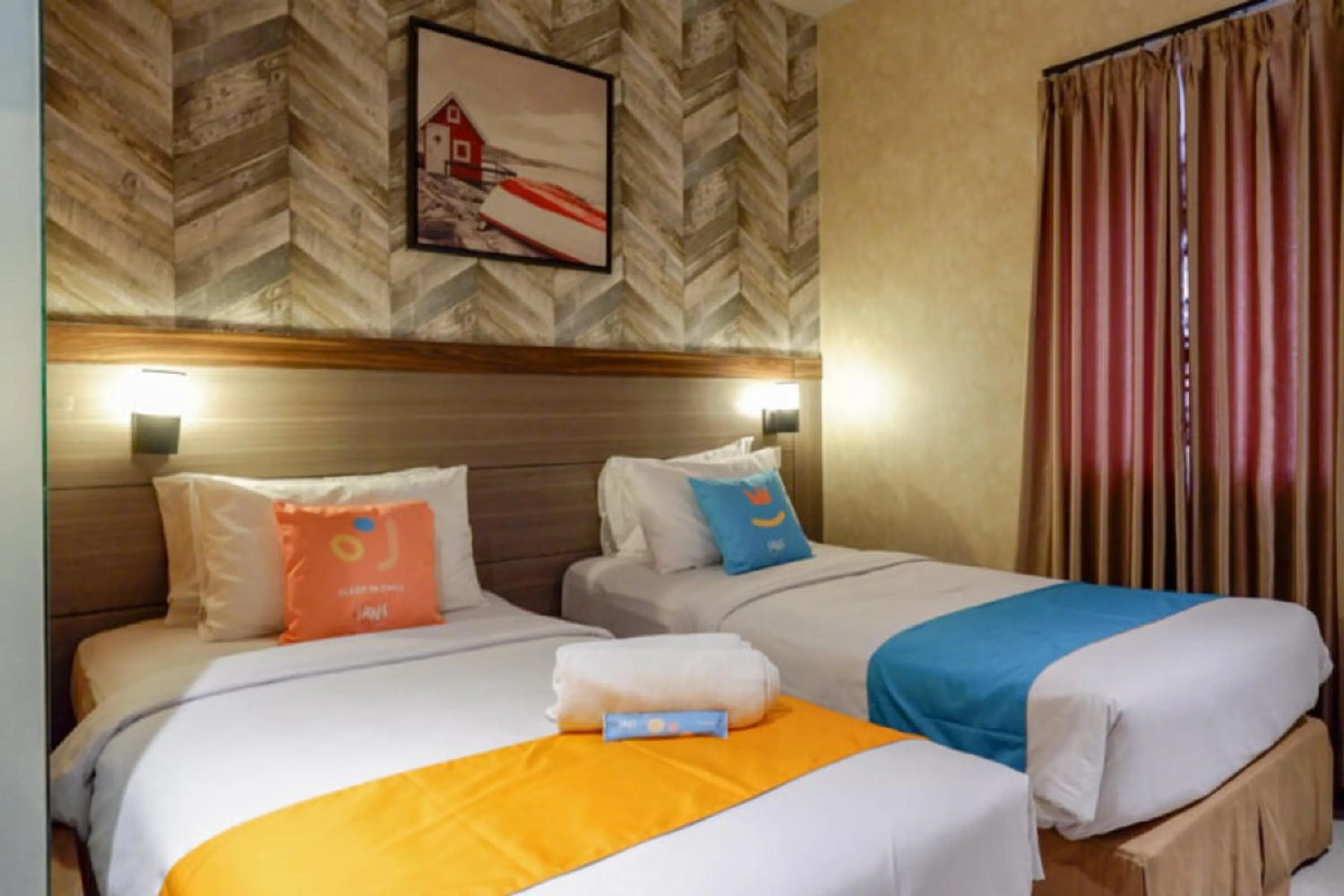 Bed in Sans Hotel Ekkon Yogyakarta by Reddoorz