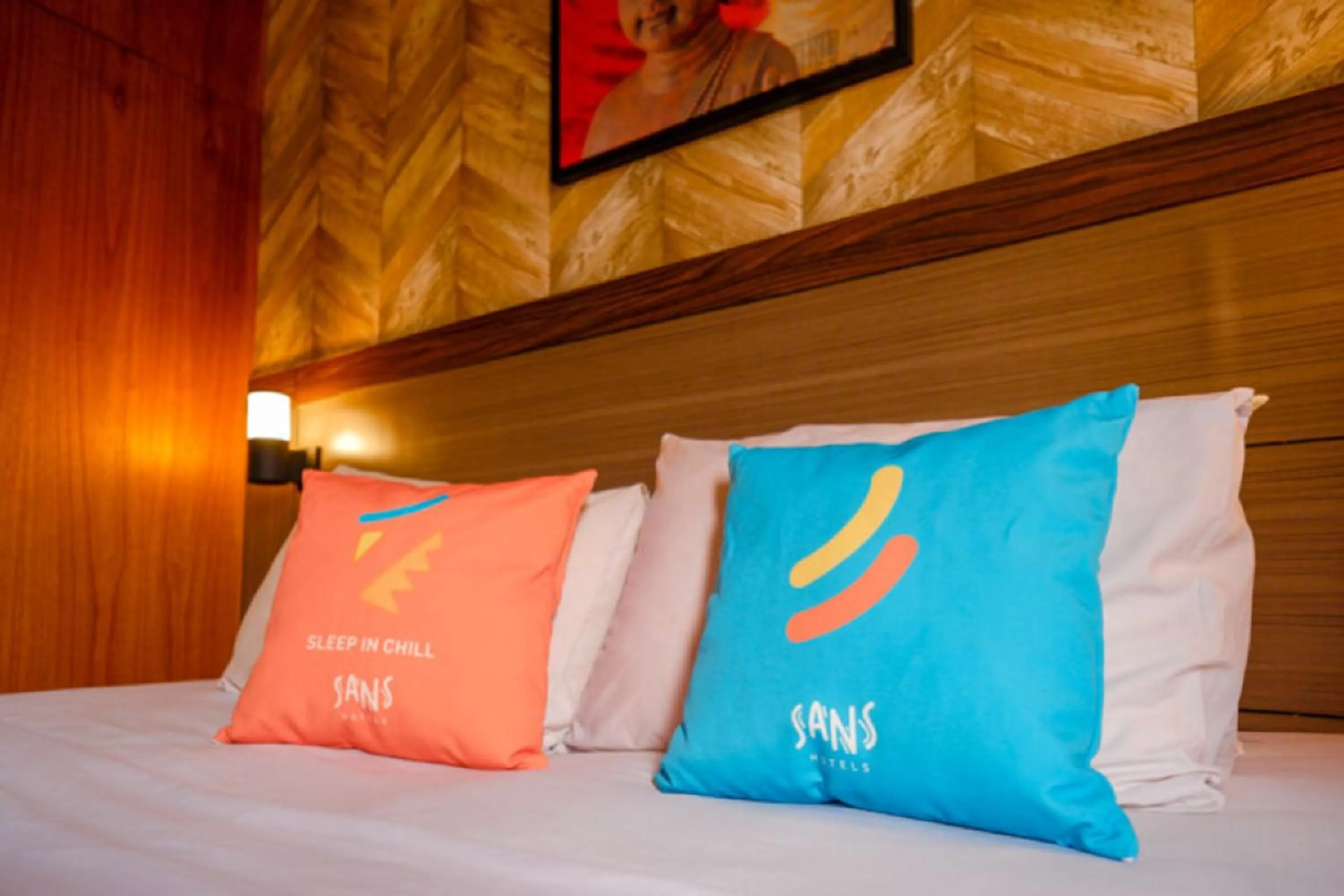 Bed in Sans Hotel Ekkon Yogyakarta by Reddoorz