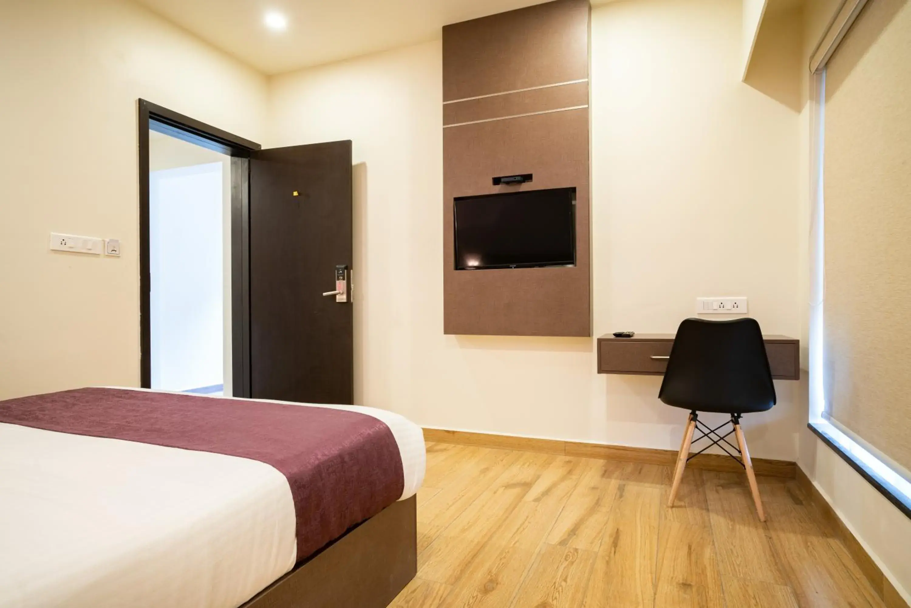 Communal lounge/ TV room, Bed in Lavender Infopark Kochi Communal lounge/ TV room, Bed in Lavender Infopark Kochi