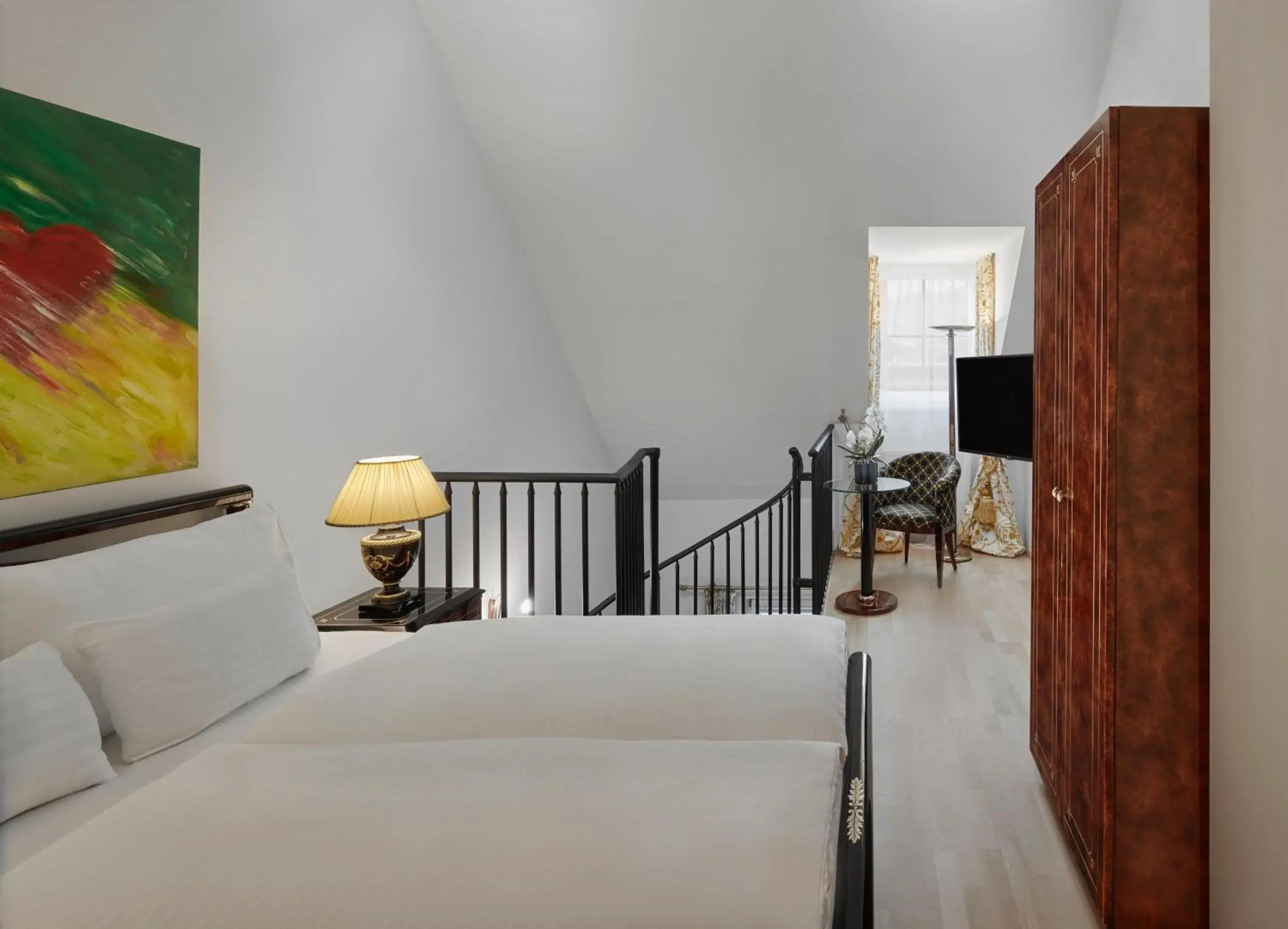 Photo of the whole room, Bed in Hotel Schwarzer Adler Innsbruck Photo of the whole room, Bed in Hotel Schwarzer Adler Innsbruck