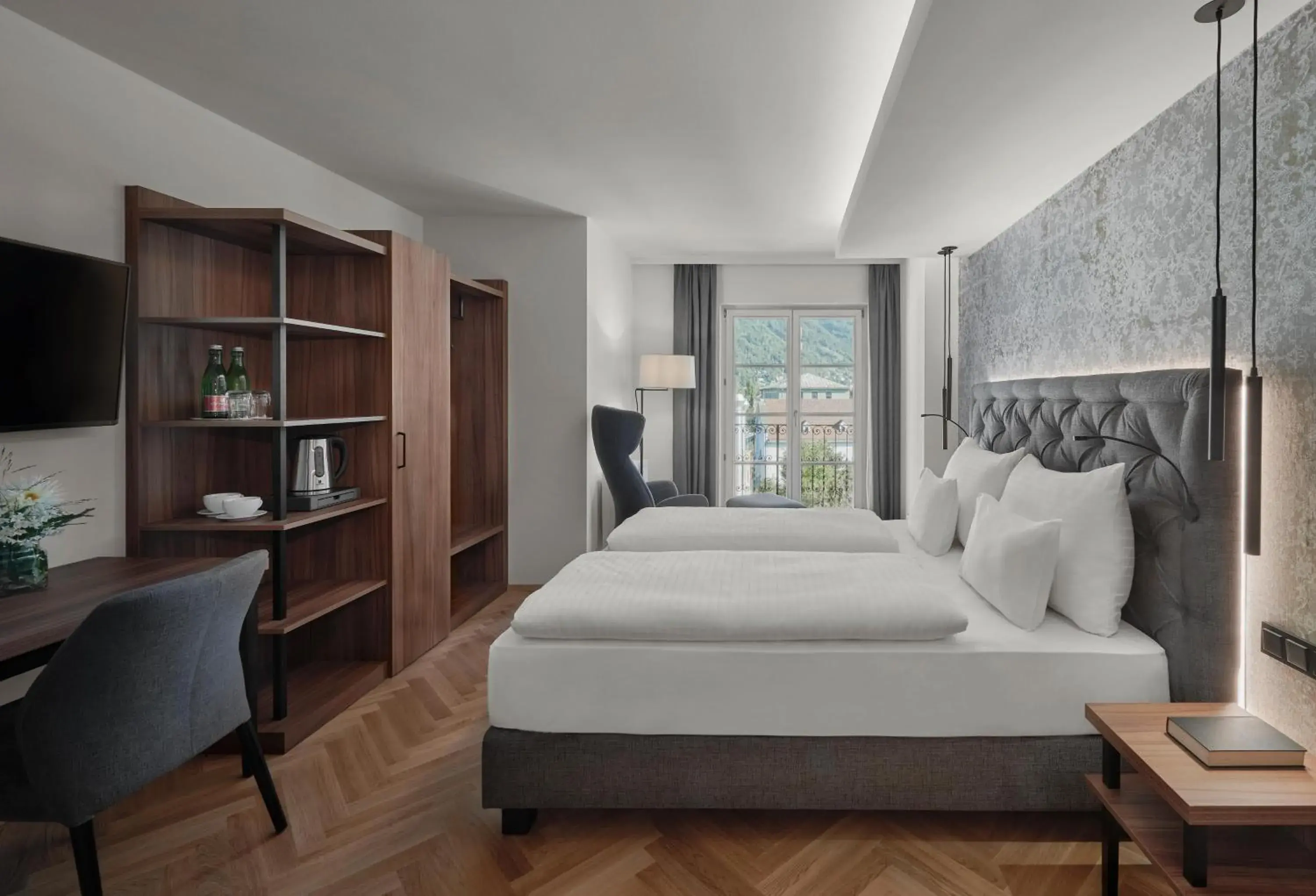 Photo of the whole room, Bed in Hotel Schwarzer Adler Innsbruck Photo of the whole room, Bed in Hotel Schwarzer Adler Innsbruck