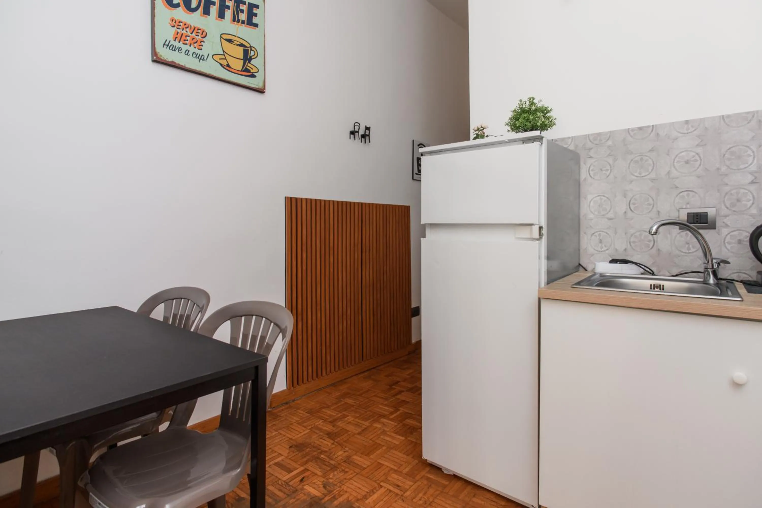Dining area in Inside Chiaia Rooms