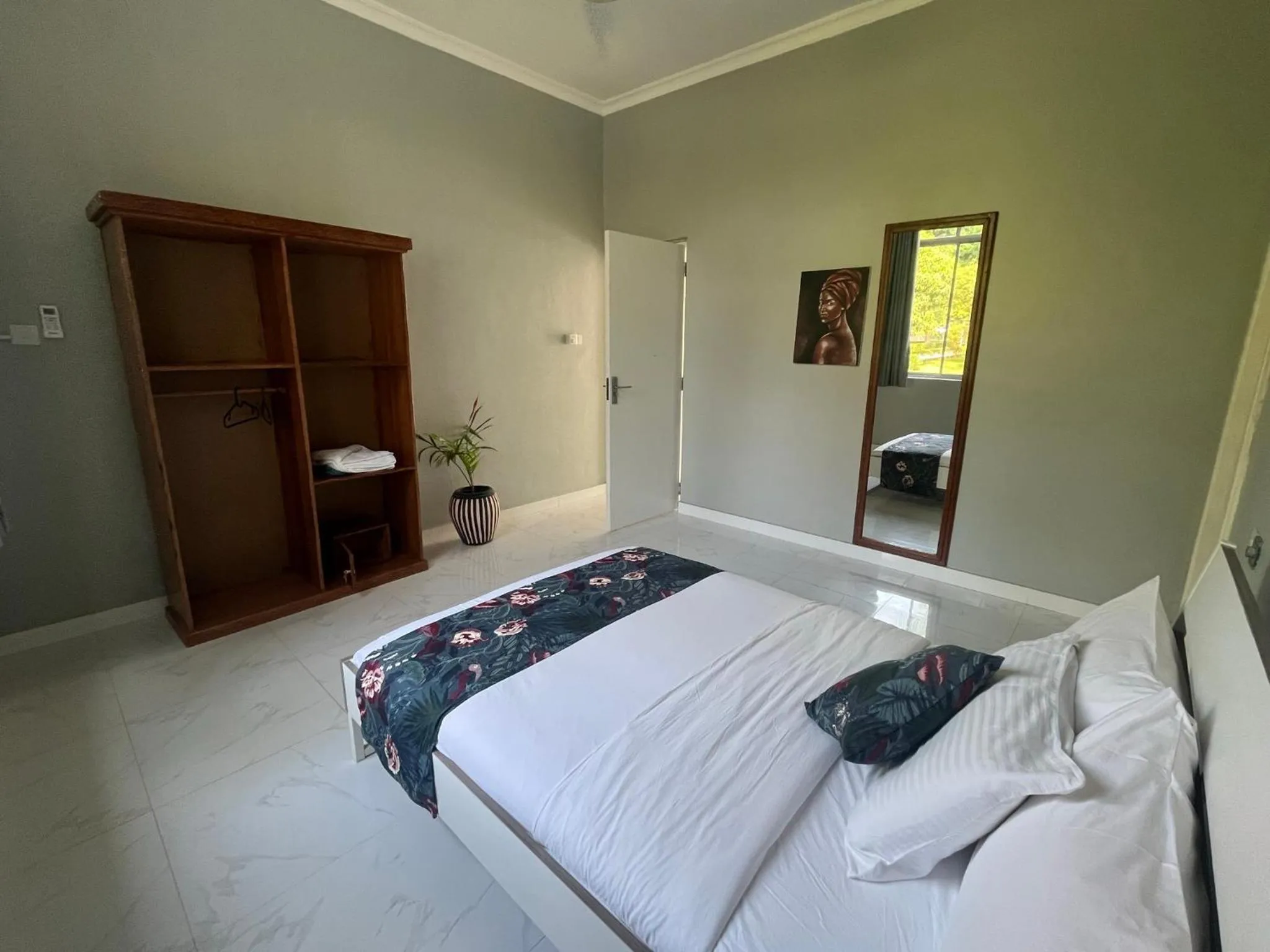 Bed in Calamari Beach Resort