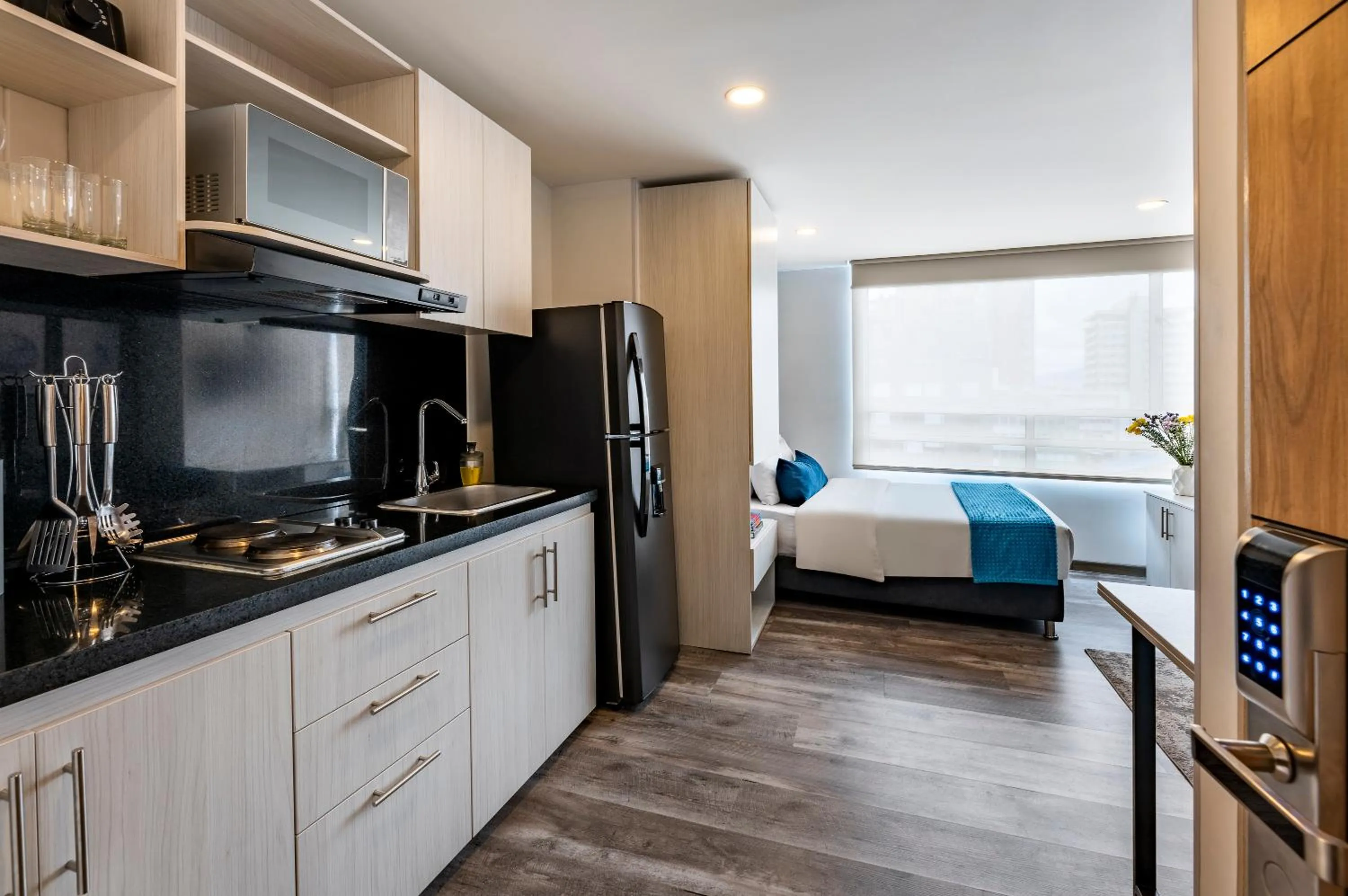 Kitchen or kitchenette, Bed in Torre Acqua Lofts - Downtown Bogota By Jalo