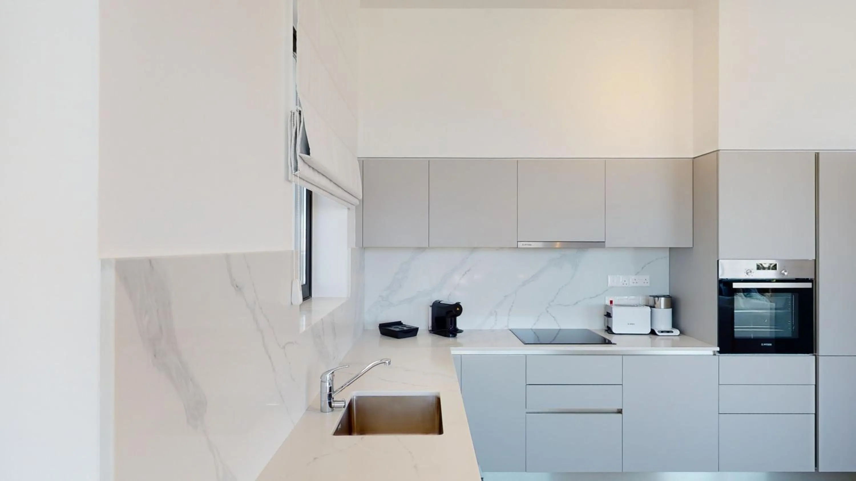 Kitchen or kitchenette in Periyiali Konnos Villas Beach Resort