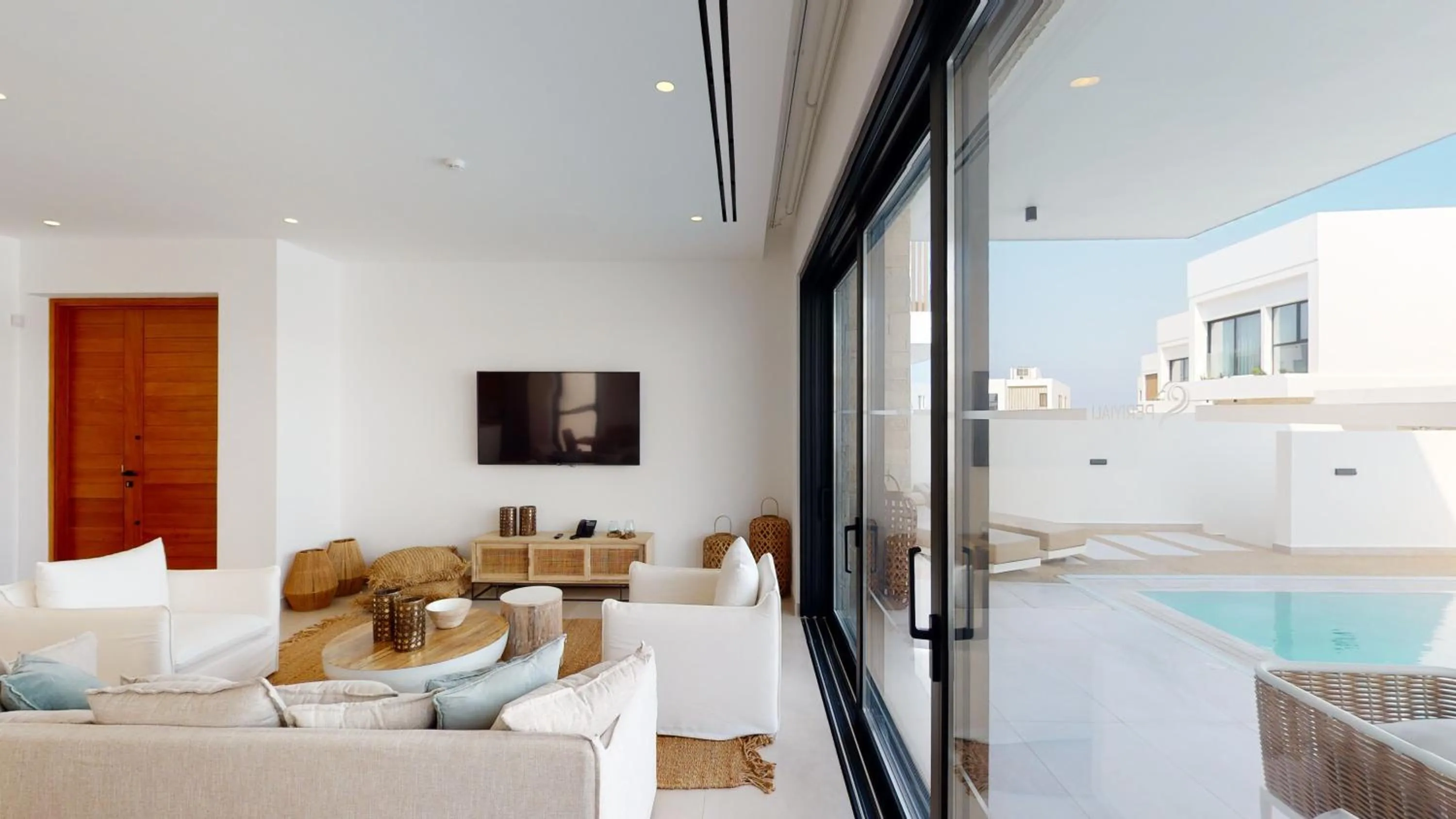 Swimming pool in Periyiali Konnos Villas Beach Resort