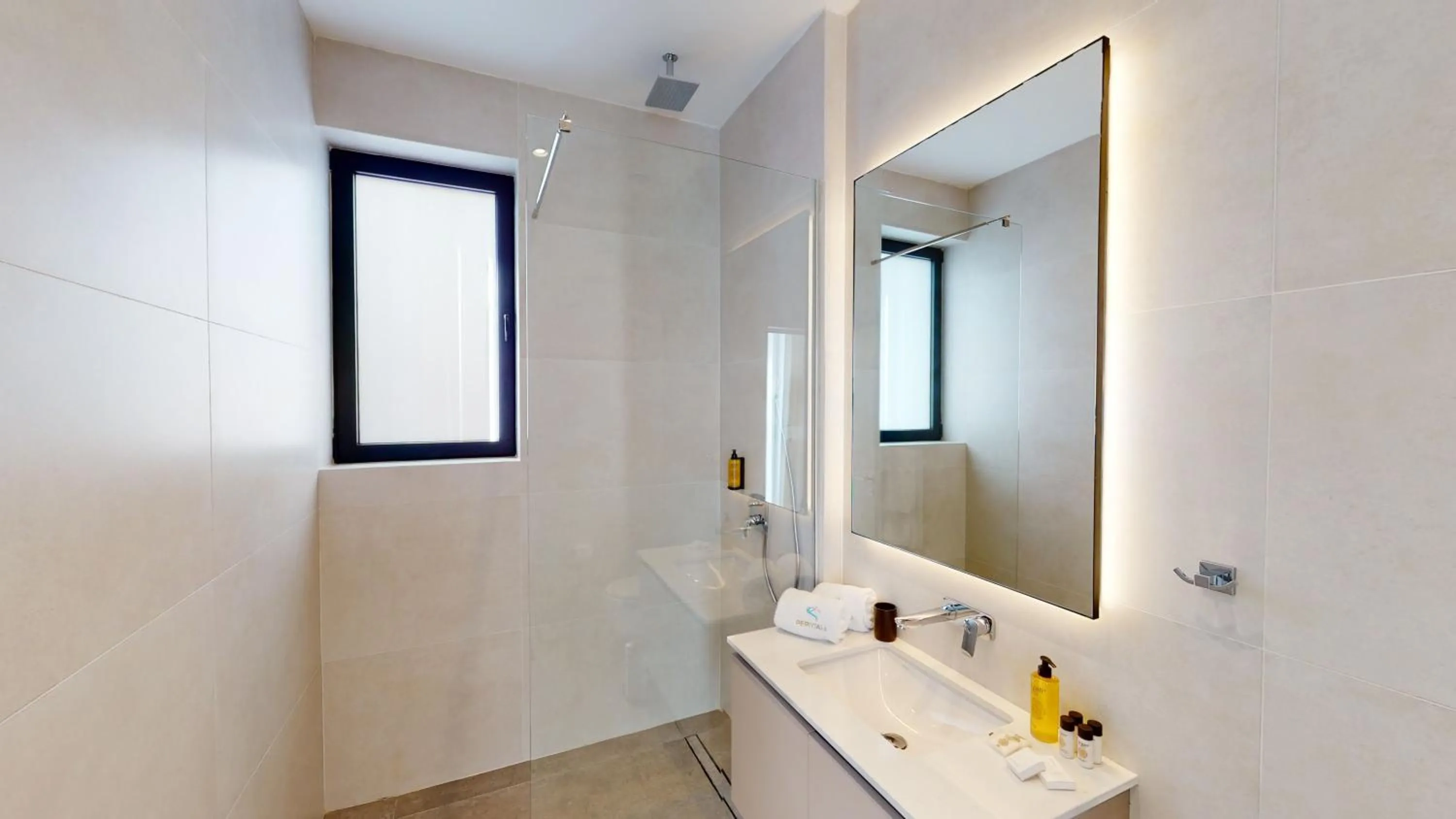 Bathroom in Periyiali Konnos Villas Beach Resort