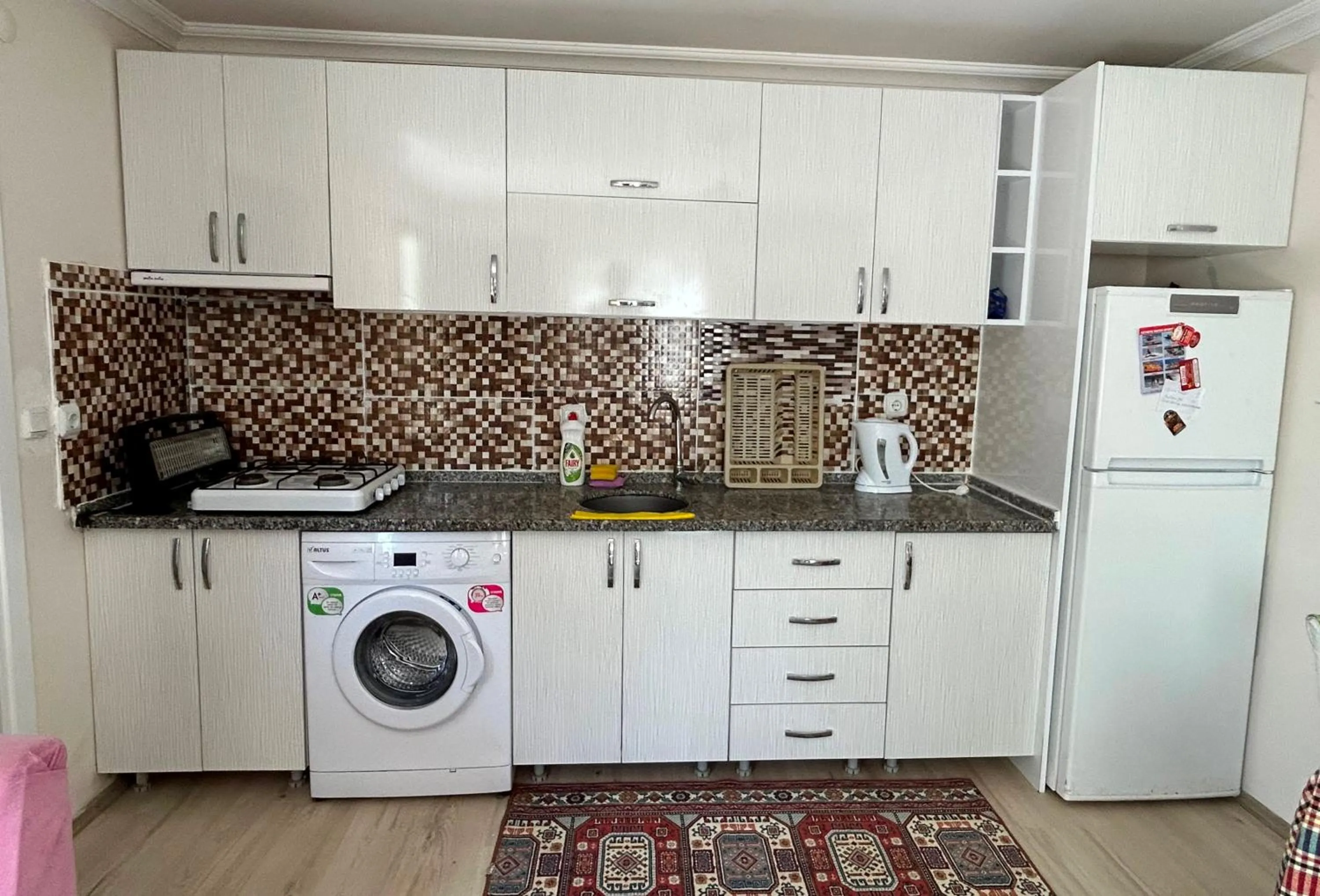 Kitchen or kitchenette in çileks apart otel