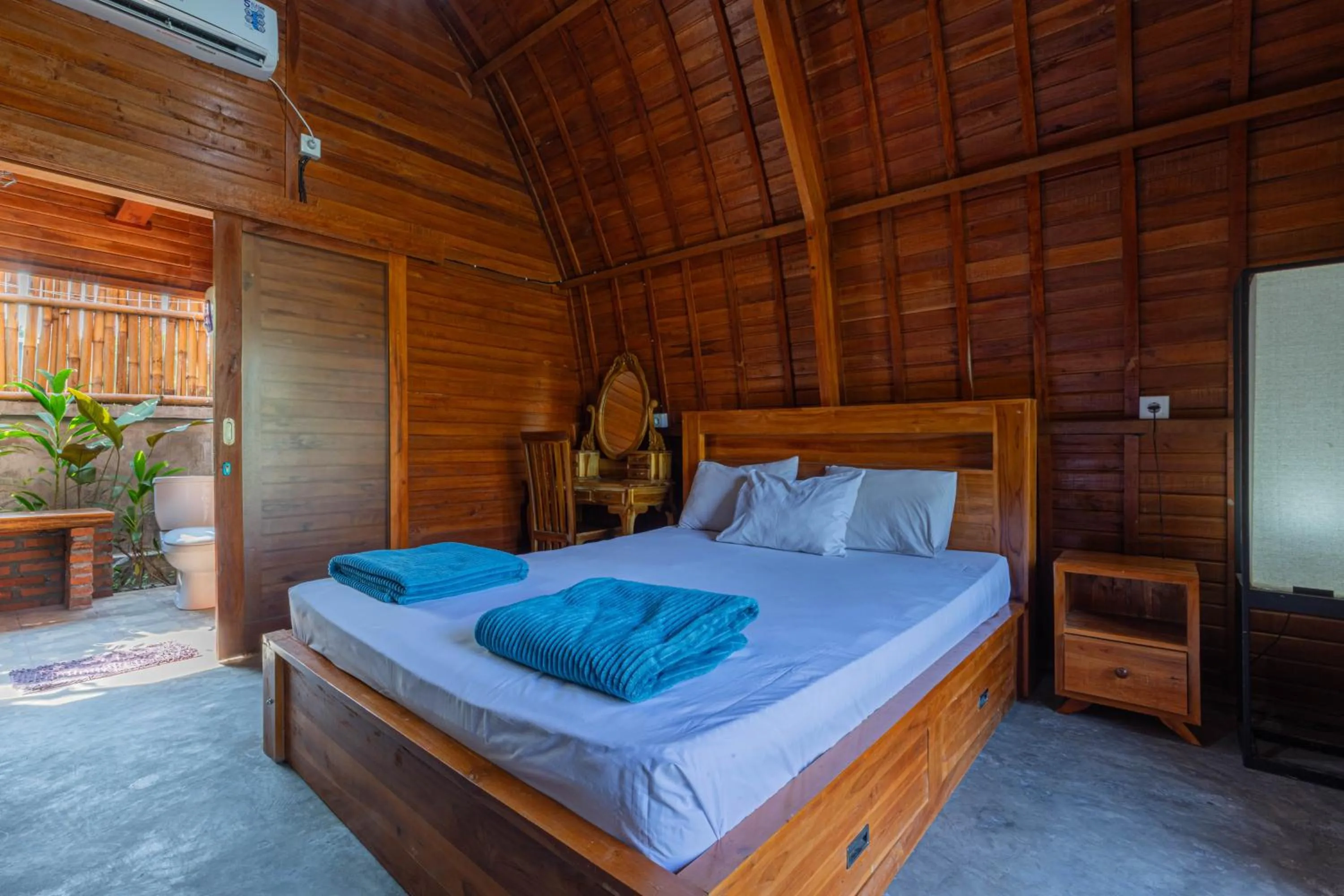 Bed in Kubu Selat Villa and Glamping