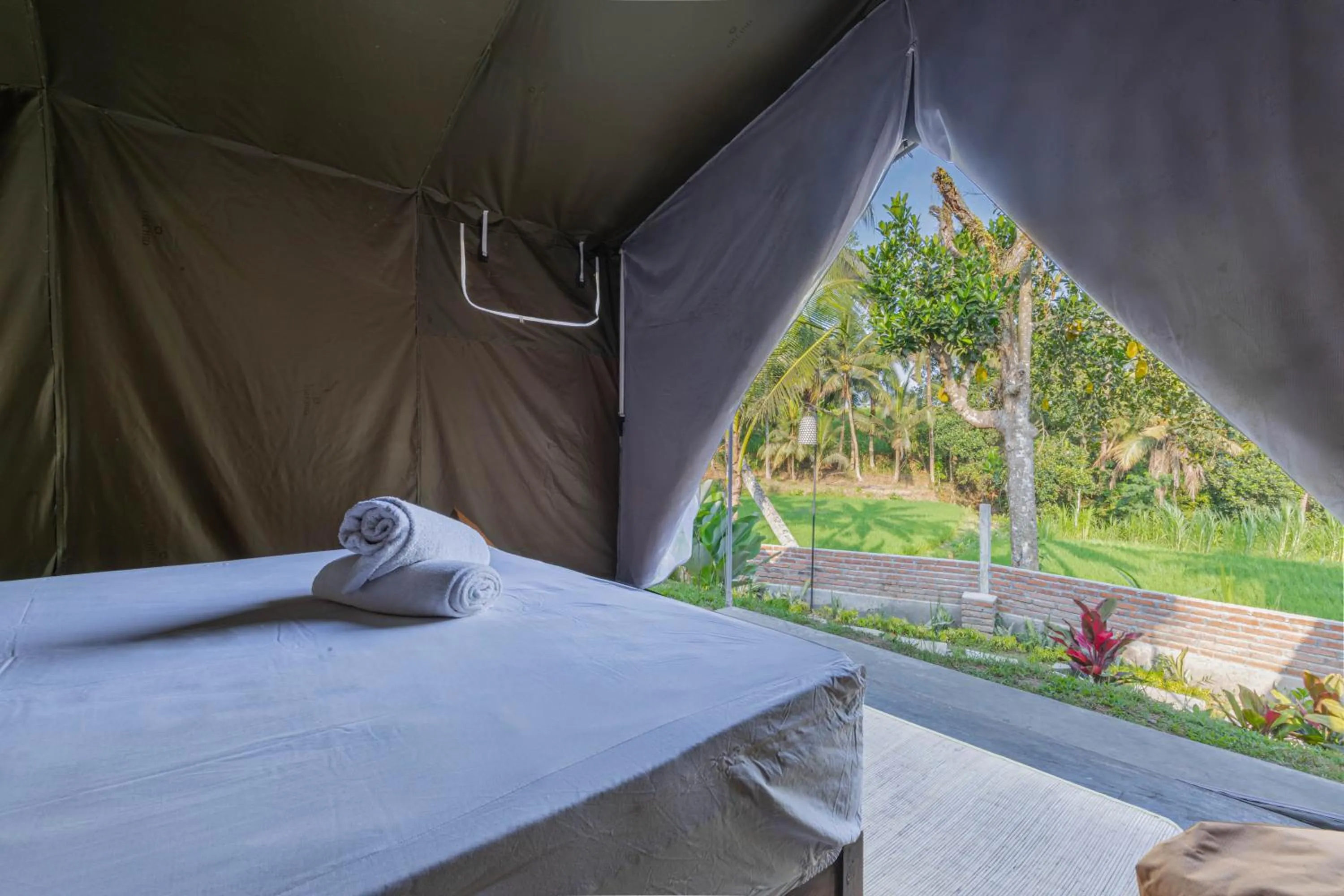Bed in Kubu Selat Villa and Glamping