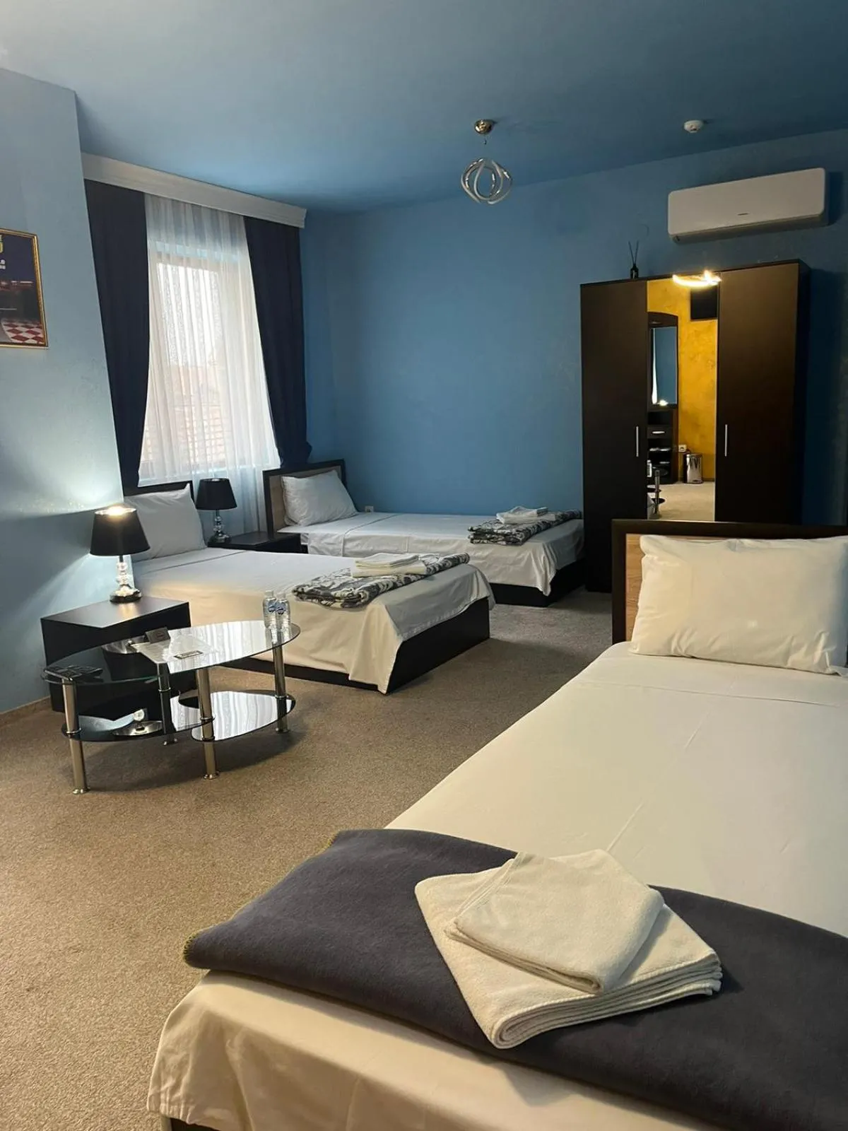 Bed in Complex MONACO HOTEL & CASINO
